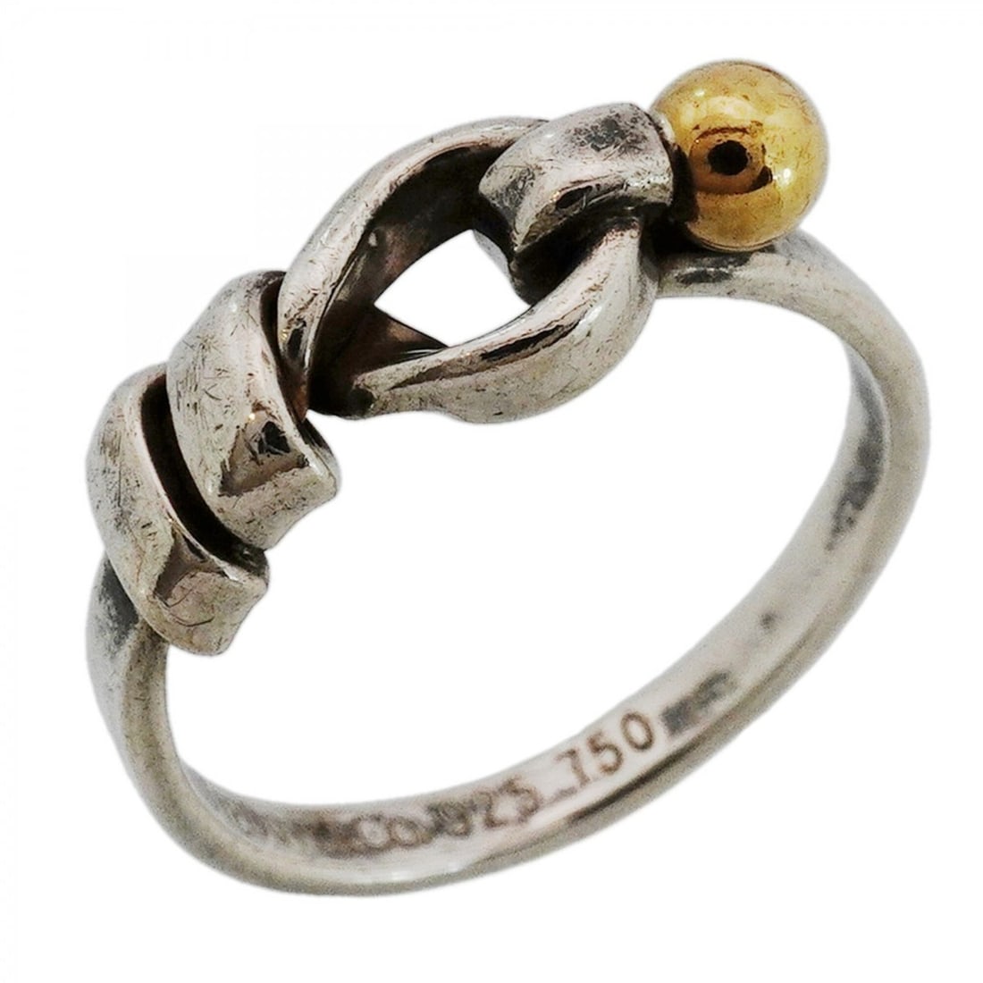 Tiffany & Co. Hook Eye Ring, 18K Yellow Gold (KYG), Sterling Silver 925, Size 12, Women's: --- Catalog ---Category: SizeJP Size: 12US Size: 6.5Category: DesignType: Band ringGender: WomenMaterial: Silver 925, Yellow gold (18K)Category: GeneralBrand: Tiffany--- Item List ---Section: Conditio