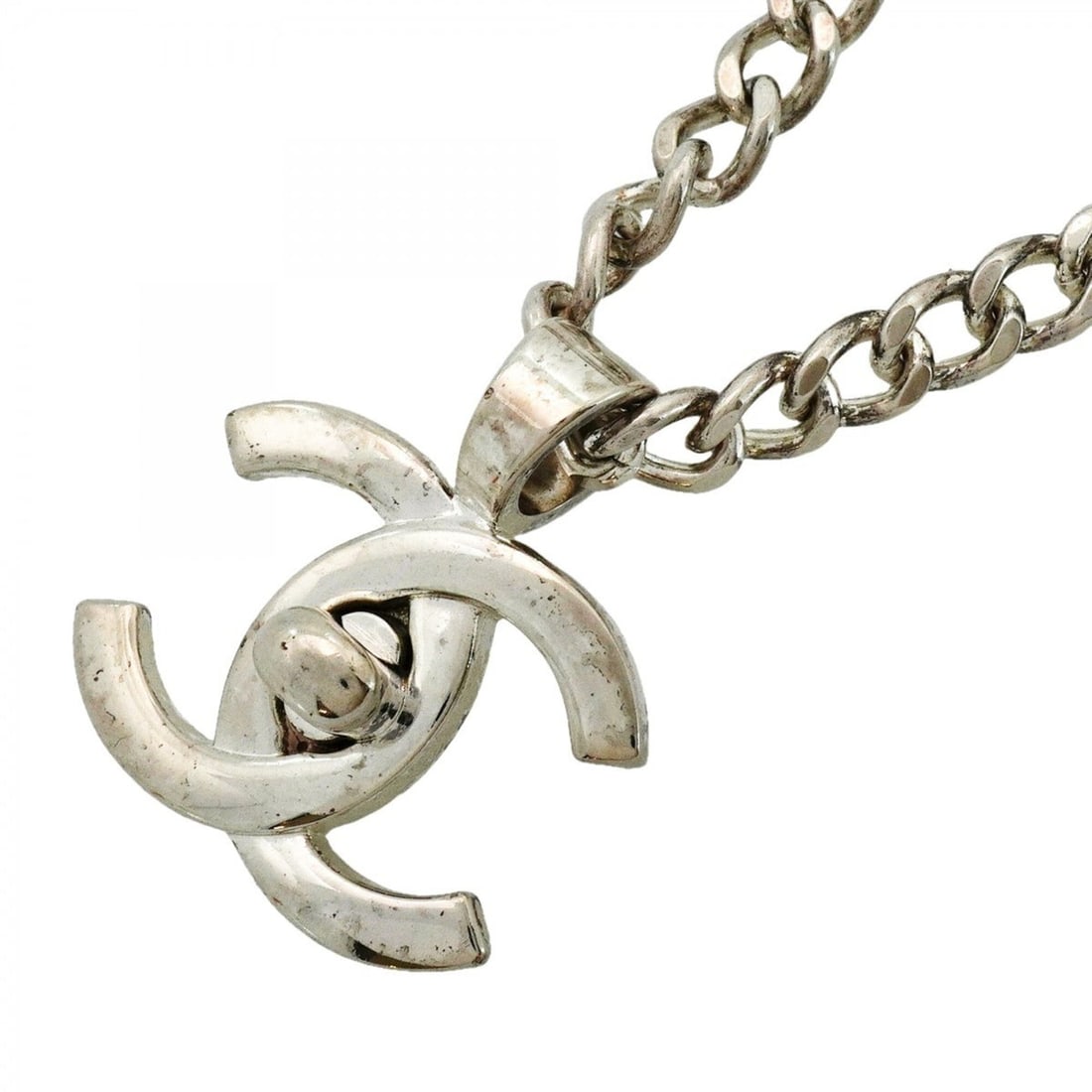 Chanel Necklace, Coco Mark, Turnlock, Metal, Silver, Men's & Women's: --- Catalog ---Category: SizePendant Size: 41.6mm x 37.3mm / 1.63'' x 1.46''Neck Circumference: 55.5 cm / 21.85''Category: DesignColor: SilverGender: Men,WomenMaterial: MetalNecklace Type: NecklaceCat