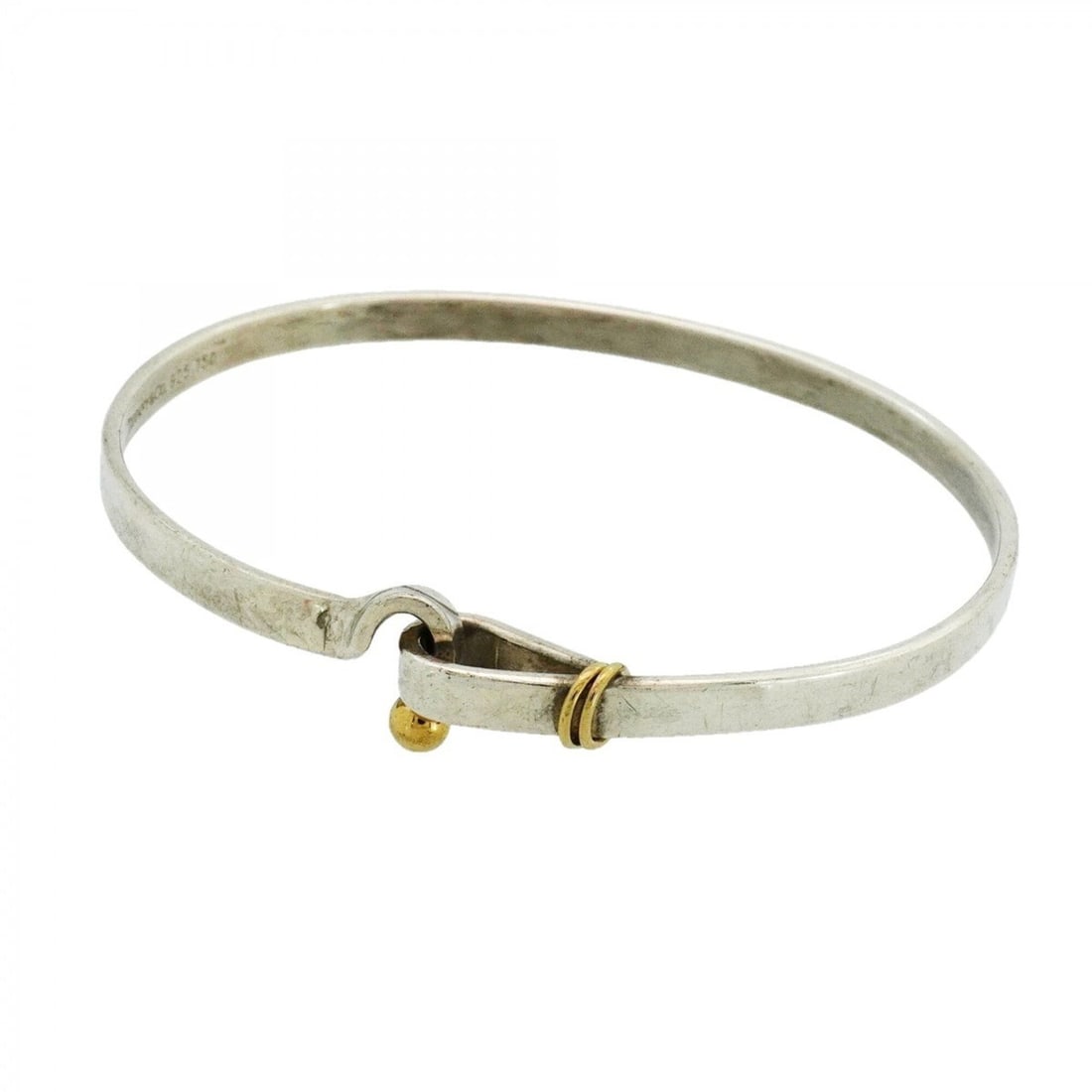 Tiffany & Co. Hook Eye Bangle, 18K Yellow Gold (KYG), Sterling Silver 925, for Men and Women: --- Catalog ---Category: SizeLength: 17.5cm / 6.88''Category: DesignType: BangleGender: Men,WomenMaterial: Silver 925, Yellow gold (18K)Category: GeneralBrand: Tiffany--- Item List ---Section: Conditi