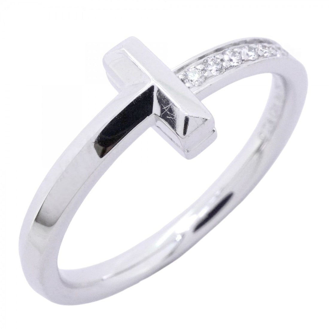 Tiffany & Co. T One Ring, 18K White Gold, Diamond, Size 15.5 (Men's/Women's): --- Catalog ---Category: SizeJP Size: 15.5US Size: 7.5Category: DesignType: Band ringStone: DiamondGender: Men,WomenMaterial: White gold (18K)Category: GeneralBrand: Tiffany--- Item List ---Section: C