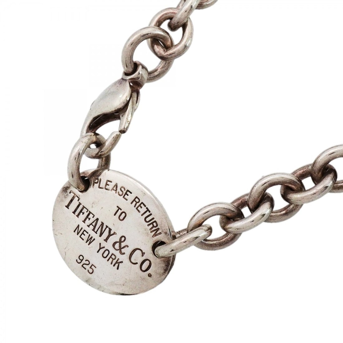 Tiffany & Co. Choker Return to Oval Sterling Silver 925 Men's/Women's P2832539: --- Catalog ---Category: SizePendant Size: 17.9mm x 22.6mm / 0.7'' x 0.88''Category: DesignGender: Men,WomenMaterial: Silver 925Necklace Type: ChokerCategory: GeneralBrand: Tiffany--- Item List ---Sec