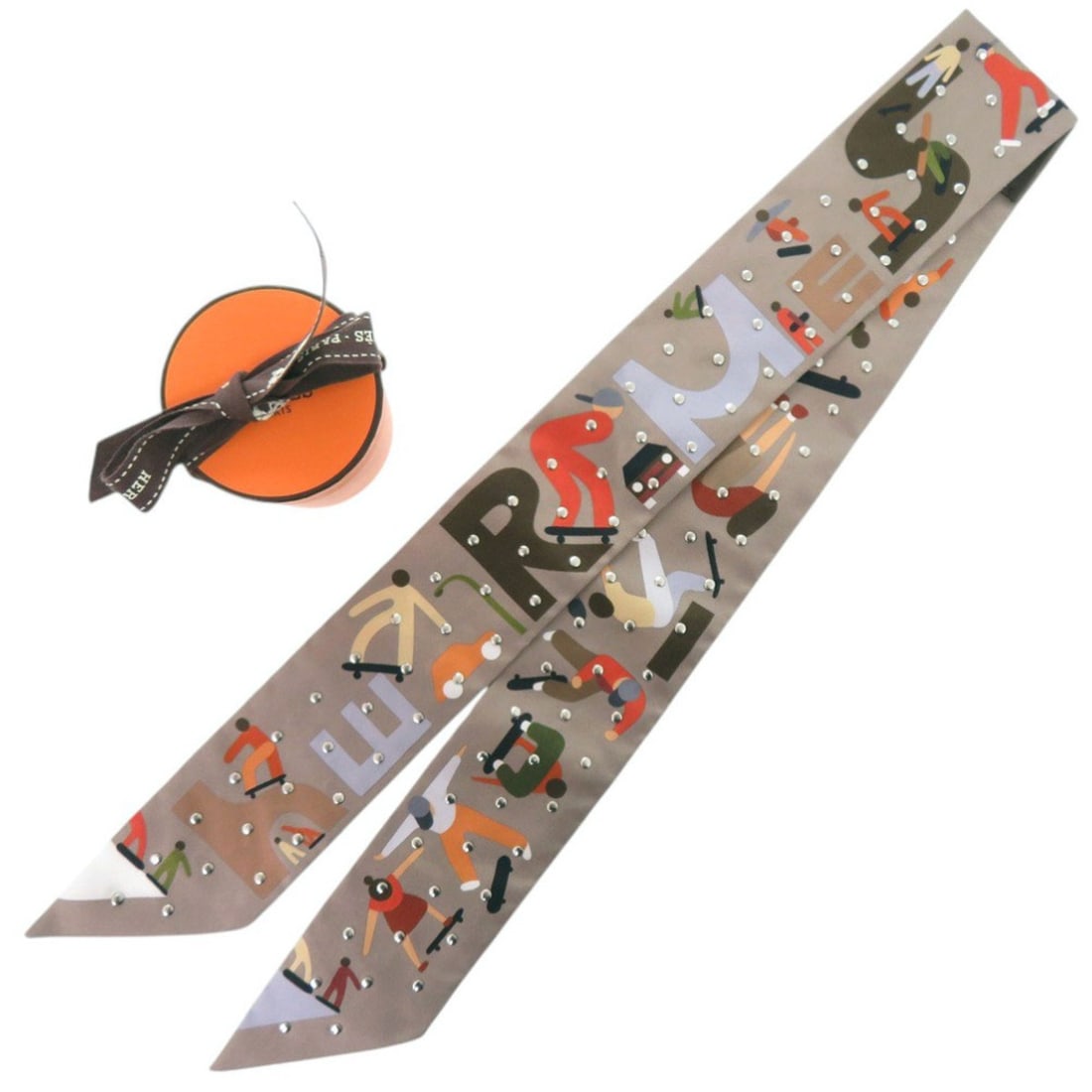 Hermes Twilly Figure Libre Stud Silk Grey Silver Hardware Scarf Muffler 1178HERMES: --- Catalog ---Category: SizeSize (LxW): 85cm / 33.46''Category: DesignType: ScarfColor: Gray, Multi-colorGender: WomenMaterial: Silk Category: GeneralLine: TwillyBrand: HermesCountry of Origin: Franc