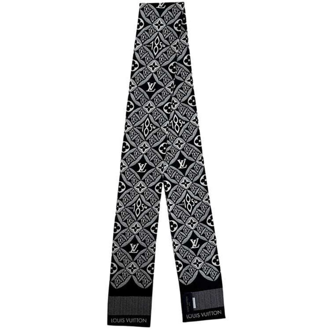 Louis Vuitton Ribbon Scarf Bandeau ec-25160 Black 1854 MP2825 100% Silk FF0261 LOUIS VUITTON Muffler: --- Catalog ---Category: SizeSize (LxW): 1.21m x 8.3cm / 47.63'' x 3.26''Category: DesignType: ScarfColor: BlackGender: Men,WomenMaterial: Silk 100%Category: GeneralBrand: Louis VuittonCountry of Orig