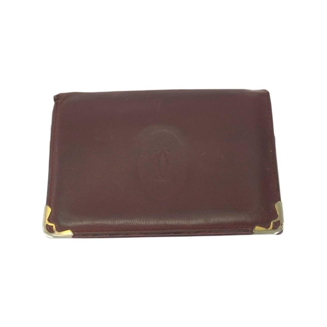 CARTIER Must Line Wine Red Leather Card Case with Gold Hardware for Women: --- Catalog ---Category: DesignType: Card caseColor: Wine redGender: Women,MenMaterial: Leather Category: GeneralBrand: CartierCountry of Origin: FranceCategory: Physical PropertiesSize (HxWxD): 7.5cm