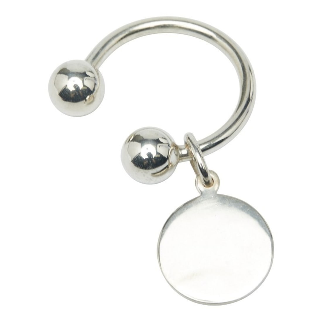 Tiffany & Co. Round Tag Key Ring in Sterling Silver for Women.: --- Catalog ---Category: SizeSize (HxWxD): 3cm x 3cm / 1.18'' x 1.18''Category: DesignType: KeyringColor: SilverGender: WomenMaterial: Sterling silverCategory: GeneralBrand: Tiffany--- Item List ---Se