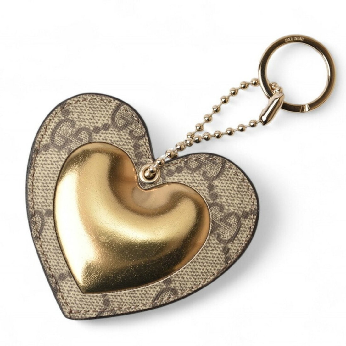 Gucci Key Holder Ring Charm GUCCI Heart Motif GG Supreme Brown Beige Gold: --- Catalog ---Category: SizeSize (HxWxD): 7.5cm x 8.3cm x 8.00mm / 2.95'' x 3.26'' x 0.31''Category: DesignType: KeyringColor: Beige, Brown, GG SupremeMaterial: GG SupremeCategory: GeneralBrand: Gucc