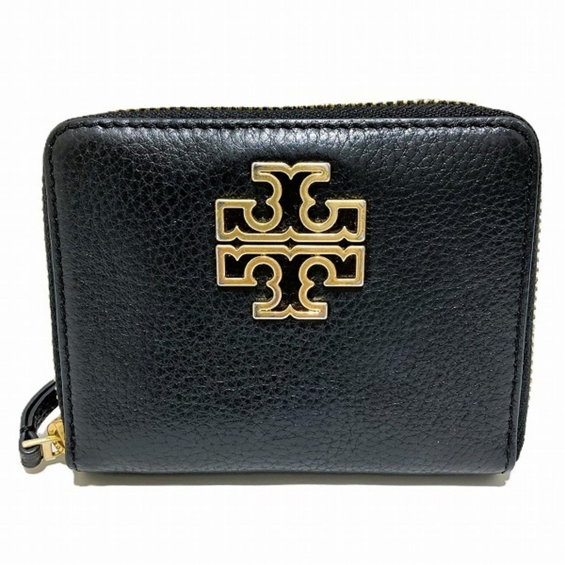 Tory Burch Round Black Wallet Bi-fold for Women: --- Catalog ---Category: SizeSize (HxWxD): 9.5cm x 12cm x 2cm / 3.74'' x 4.72'' x 0.78''Category: DesignType: Wallet (bi-fold)Color: BlackGender: WomenMaterial: Leather Category: GeneralBrand: Tory Bu