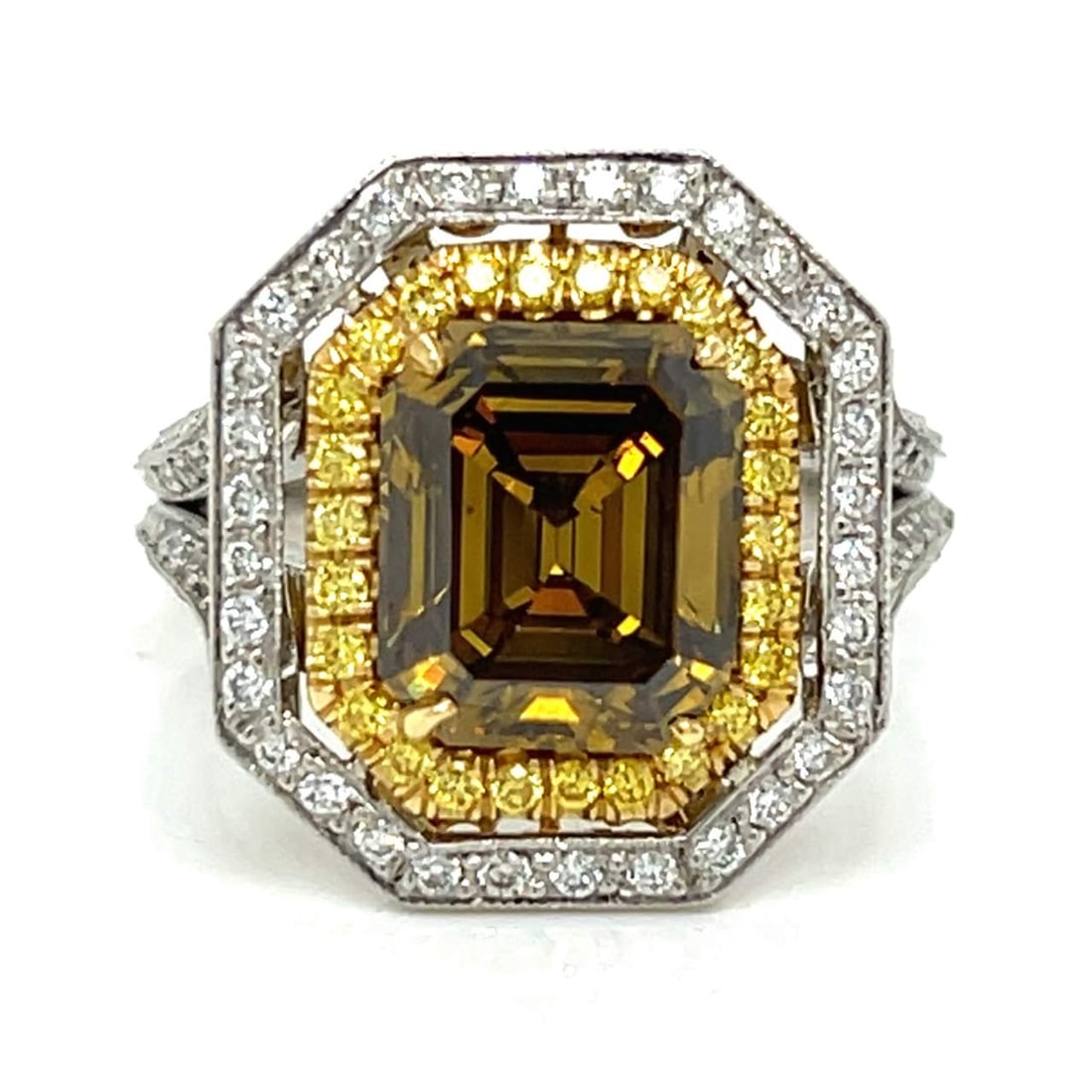 18K Yellow Gold & Platinum GIA Certified 3.43 Ct. Fancy Yellow Diamond Ring: 18K Yellow Gold & Platinum GIA Certified 3.43 Ct. Fancy Yellow Diamond RingWeighing 13.0 gramsSet with 3.43 Ct GIA Certified Emerald-cut DiamondNatural Fancy Deep Yellow-Brown ColorAlong with app. 2.0