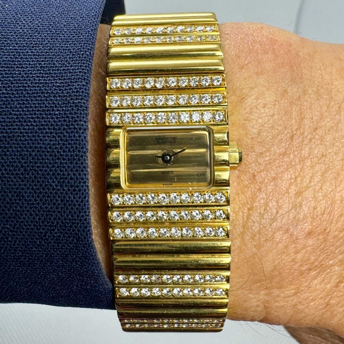 Van Cleef & Arpels 18K Yellow Gold Watch: Van Cleef & Arpels 18K Yellow Gold WatchWeighing 119.1 gramsSet with 160 Diamonds weighing app. 3.00 Ct.D-F Color, VVS-VS ClarityAll original Diamonds19mm x 17mm CaseQuartz movement7.25 inches in