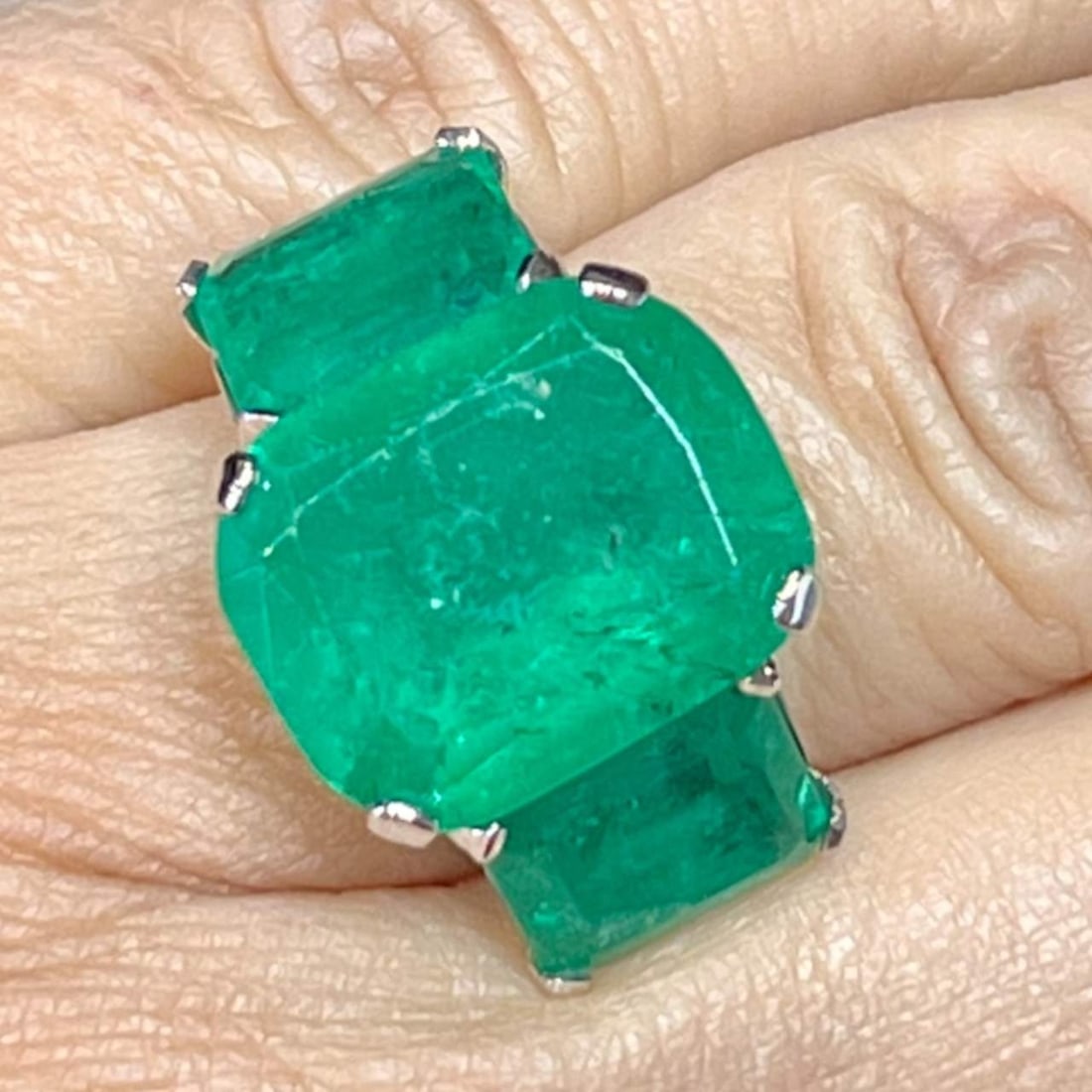 Art Deco Platinum Colombian Emerald and Diamond Ring: Art Deco Platinum Colombian Emerald and Diamond RingWeighing 9.2 gramsSet with 3 Colombian Emeralds weighing 9.37 Ct., 4.47 Ct., and 4.42 Ct.Along with 18 European-cut Diamonds weighing app. 0.25 Ct.E