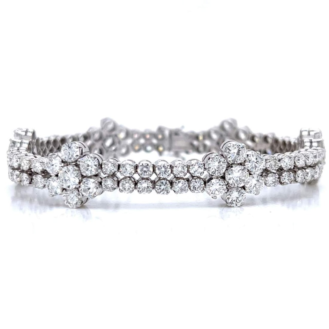 1950’s Platinum 16.50 Ct. Diamond Bracelet: 1950’s Platinum 16.50 Ct. Diamond BraceletWeighing 28.5 gramsSet with 42 Diamonds weighing app. 11.50 Ct.Along with 72 Diamonds weighing app. 5.00 Ct.D-G Color, VVS-VS Clarity7.5 inches in length