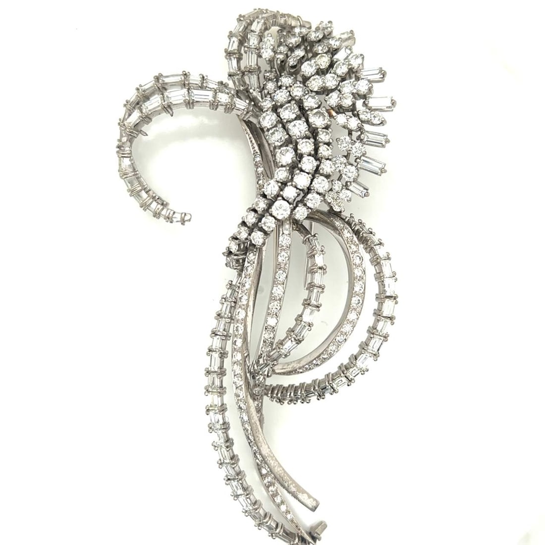 1950's Platinum 21.25 Ct. Diamond Brooch: 1950's Platinum 21.25 Ct. Diamond BroochWeighing 61.3 gramsSet with app. 21.25 Ct. of DiamondsG-H Color, VVS-VS Clarity4.75 inches in length