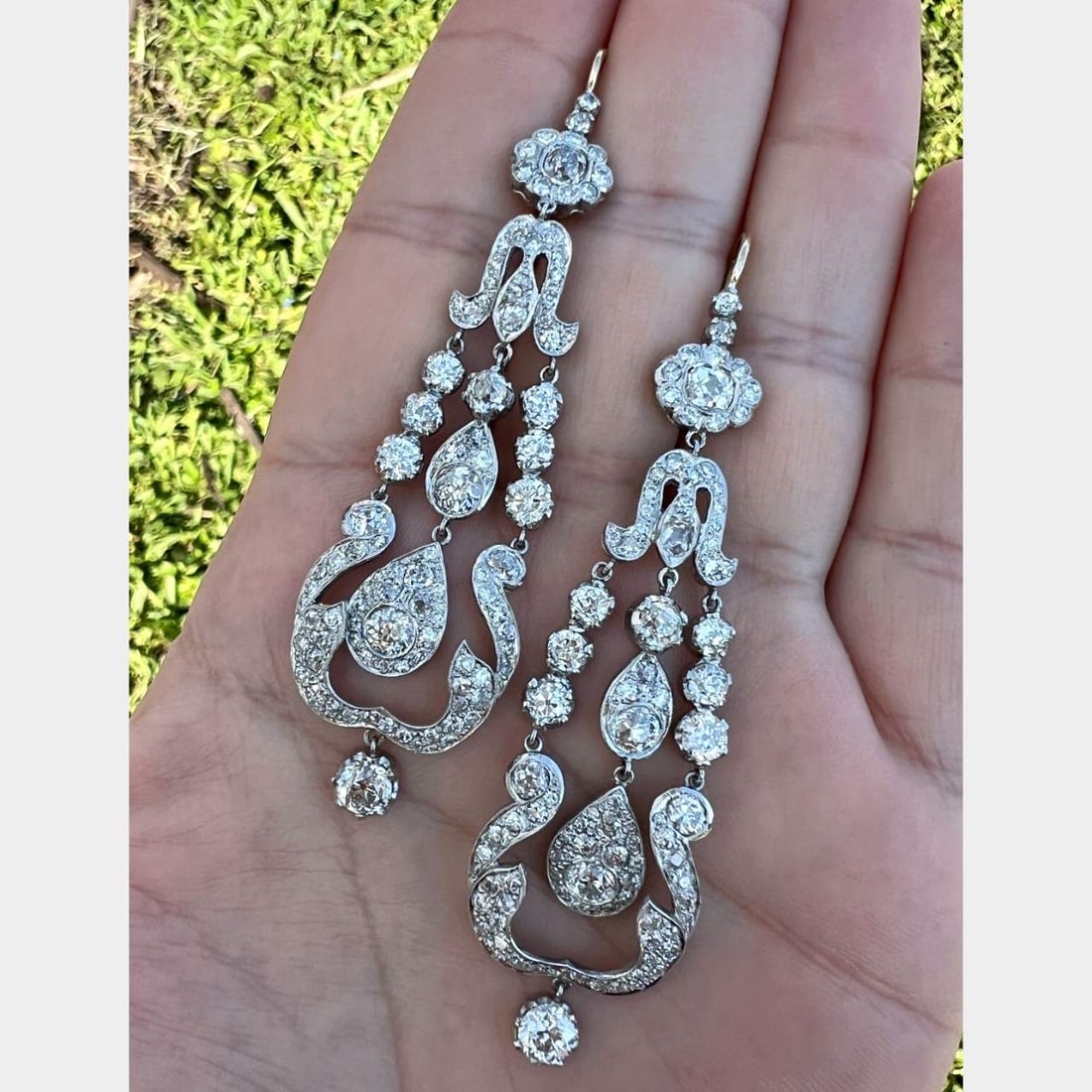 Platinum & 18K White Gold 13.00 Ct. Diamond Earrings: Platinum & 18K White Gold 13.00 Ct. Diamond EarringsWeighing 26.1 gramsSet with app. 13.00 Ct. of European-cut Diamonds F-H Color, VS1-I1 Clarity3.25 inches in length