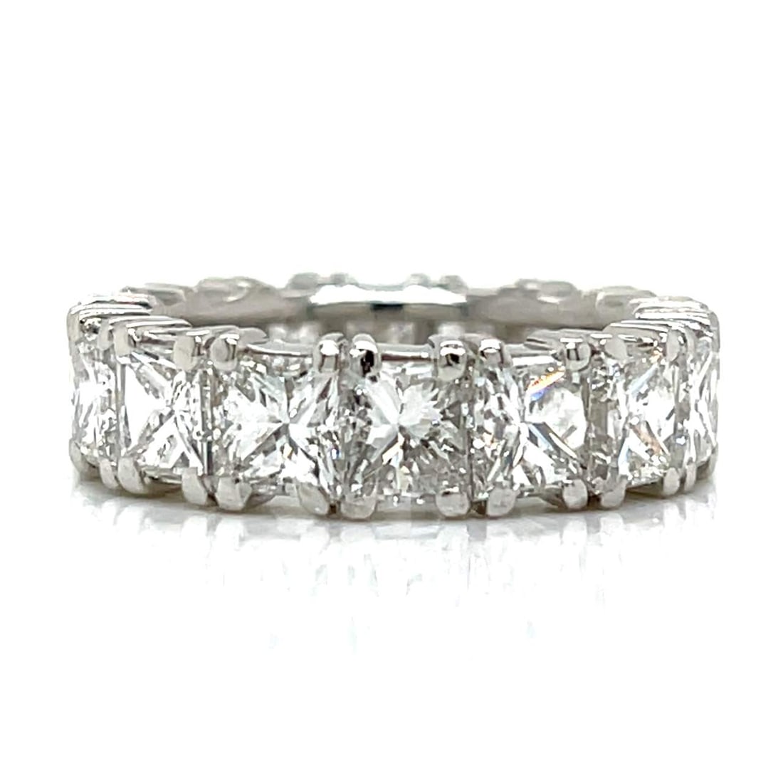 Platinum 11.20 Ct. Princess-cut Diamond Eternity Ring: Platinum 11.20 Ct. Princess-cut Diamond Eternity RingWeighing 9.7 gramsSet with 16 Princess-cut Diamonds weighing app. 11.20 Ct.G-H Color, VVS-VS Clarity3 stones are chippedRing Size 6.25