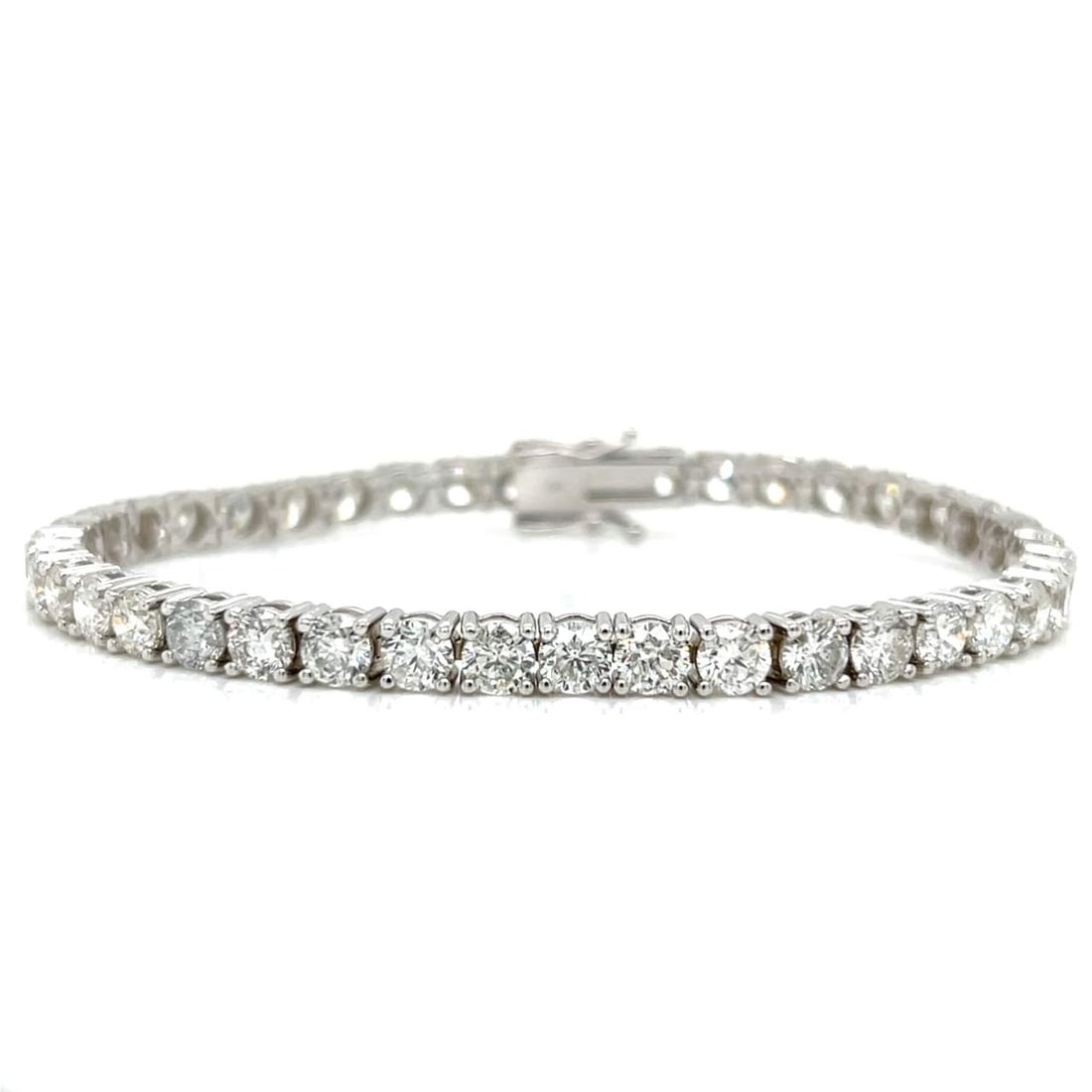 14K White Gold 13.00 Ct. Diamond Tennis Bracelet: 14K White Gold 13.00 Ct. Diamond Tennis BraceletWeighing 14.7 gramsSet with 40 Diamonds weighing app. 13.00 Ct.F-G Color, SI1-SI3 Clarity7 inches in length