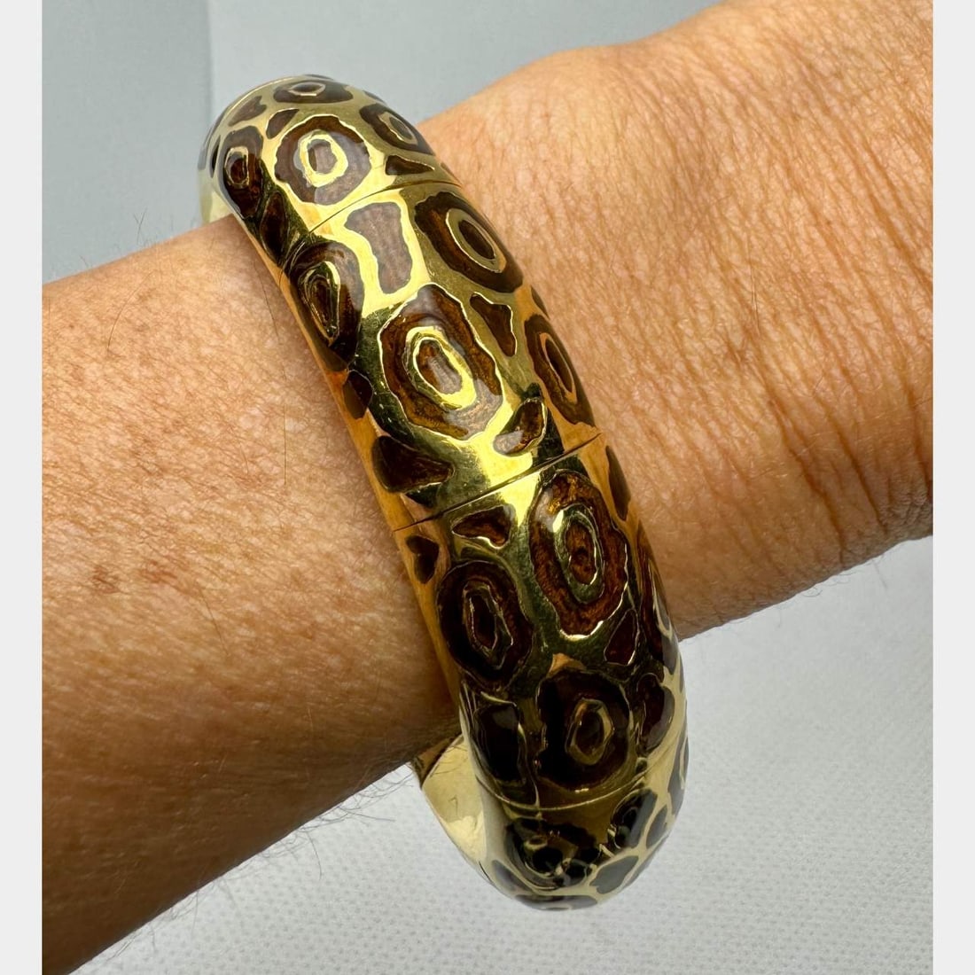 18K Yellow Gold Bangle Bracelet: 18K Yellow Gold Bangle BraceletWeighing 106.1 gramsEnamelFits 6 inch wristHas Hallmarks