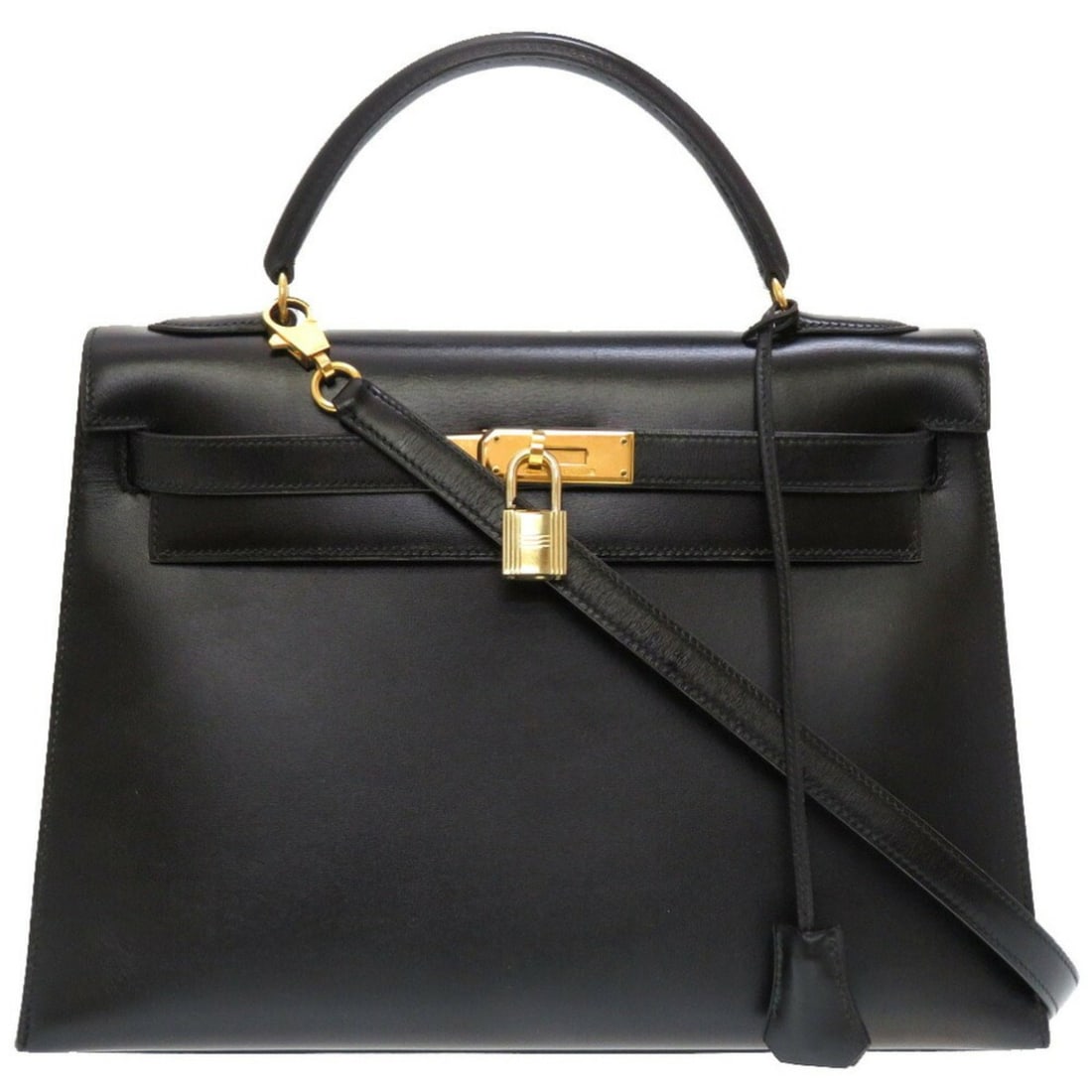 Hermes Kelly 32 Outer stitching Box calf Black ?V stamp Handbag 0024 HERMES: --- Catalog ---Category: SizeSize (HxWxD): 23cm x 32cm x 12cm / 9.05'' x 12.59'' x 4.72''Category: DesignType: HandbagColor: BlackGender: WomenMaterial: Box calf leather Category: GeneralBrand: Hermes