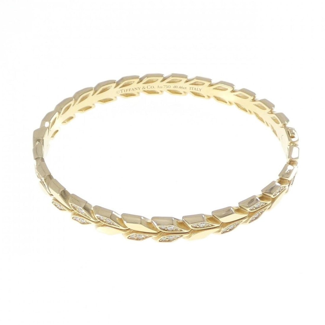 Tiffany Vine Hinge Bangle 0.46ct: --- Catalog ---Category: SizeLength: 16cm / 6.29''Category: DesignType: BangleColor: Yellow goldStone: DiamondGender: WomenMaterial: Yellow gold (18K)Weight (ct.): 0.46Category: GeneralBrand: Tiffany-