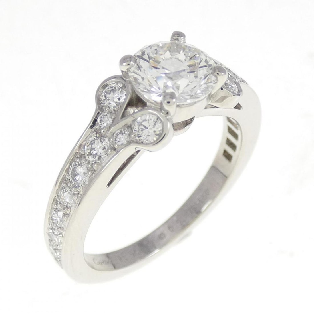 Cartier Ballerina Ring 0.92CT G VS1 VG: --- Catalog ---Category: SizeWidth: 6.8mm / 0.27''Weight: 6.2g / 0.21oz.US Size: 6.5Brand Size: 52Category: DesignType: Band ringStone: DiamondGender: WomenClarity: VS1Material: PlatinumColor Grade: G