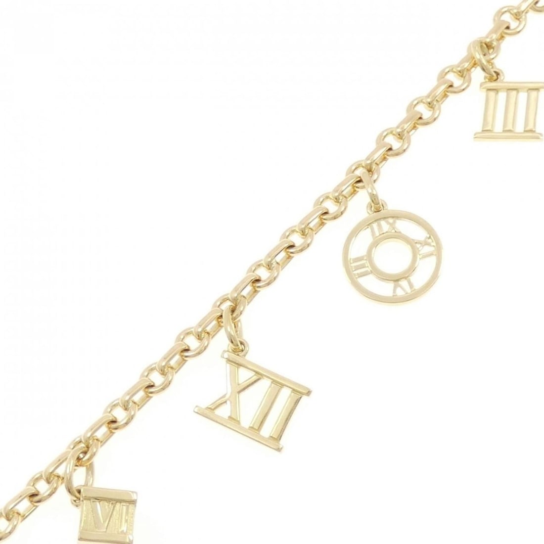 Tiffany Atlas 5 Charm Bracelet: --- Catalog ---Category: SizeLength: 18cm / 7.08''Category: DesignType: Charm braceletColor: Yellow goldGender: WomenMaterial: Yellow gold (18K)Category: GeneralBrand: Tiffany--- Item List