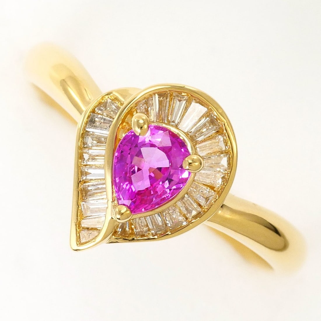 18K (18-karat) Yellow Gold Ring with 1 Pink Sapphire (0.41 ct) and 0.17 ct Diamond. Includes: --- Catalog ---Category: SizeWidth: 11mm / 0.43''Weight: 2.8g / 0.09oz.JP Size: 12US Size: 6.5Category: DesignType: Band ringColor: Pink, Yellow goldMetal: GoldStone: Diamond, SapphireGender: WomenMat
