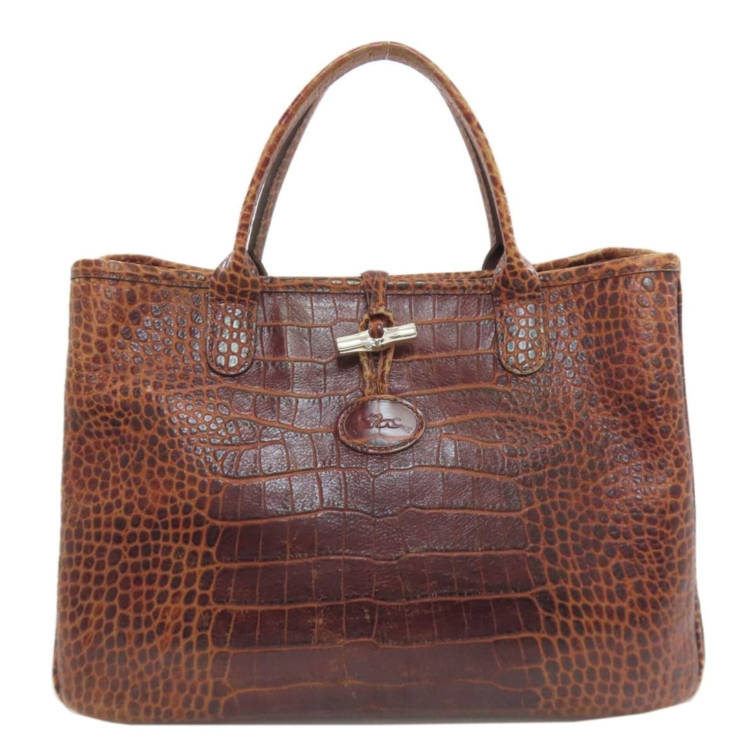 Longchamp Le Roseau embossed leather handbag for women.: --- Catalog ---Category: SizeSize (HxWxD): 24cm x 34cm x 11.5cm / 9.44'' x 13.38'' x 4.52''Category: DesignType: HandbagColor: BrownGender: WomenMaterial: Leather Category: GeneralBrand: Longchamp--- 
