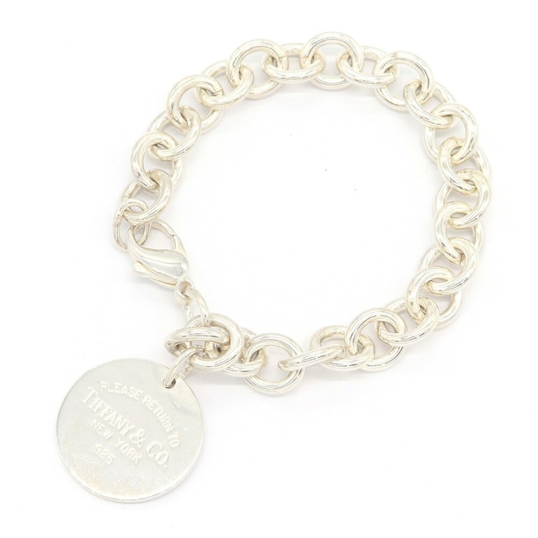 Tiffany & Co. Return to Round Tag Bracelet, Sterling Silver 925 Bangle, Women's.: --- Catalog ---Category: SizeLength: 17.5cm / 6.88''Category: DesignType: Charm braceletColor: SilverGender: WomenMaterial: Sterling silver 925Category: GeneralBrand: Tiffany--- Item List ---Section: 
