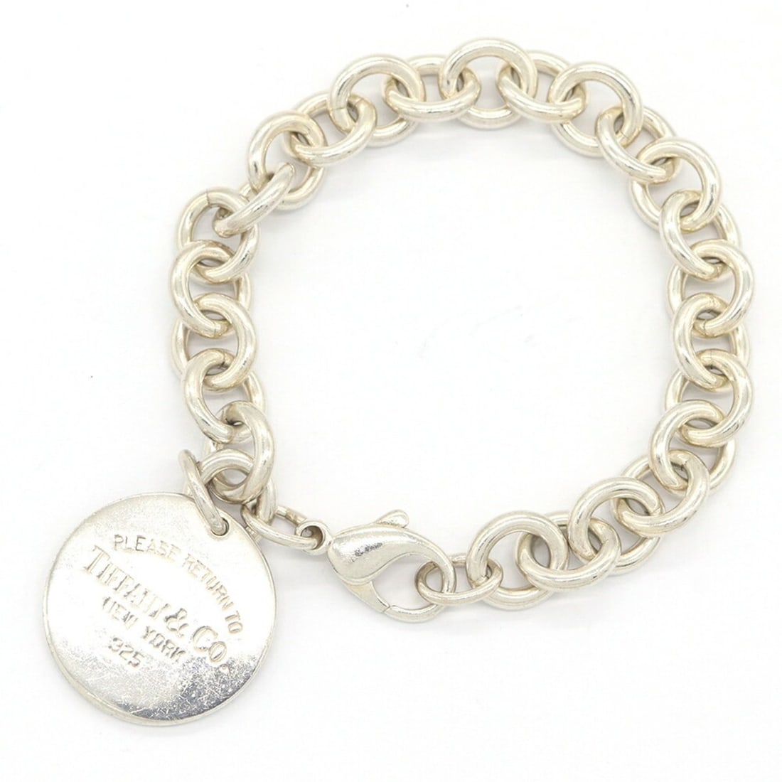 Tiffany & Co. Return to Round Tag Bracelet, Sterling Silver 925 Bangle Chain Bracelet for Women.: --- Catalog ---Category: SizeLength: 17cm / 6.69''Category: DesignType: Charm braceletColor: SilverGender: WomenMaterial: Sterling silver 925Category: GeneralBrand: Tiffany--- Item List ---Section: Co