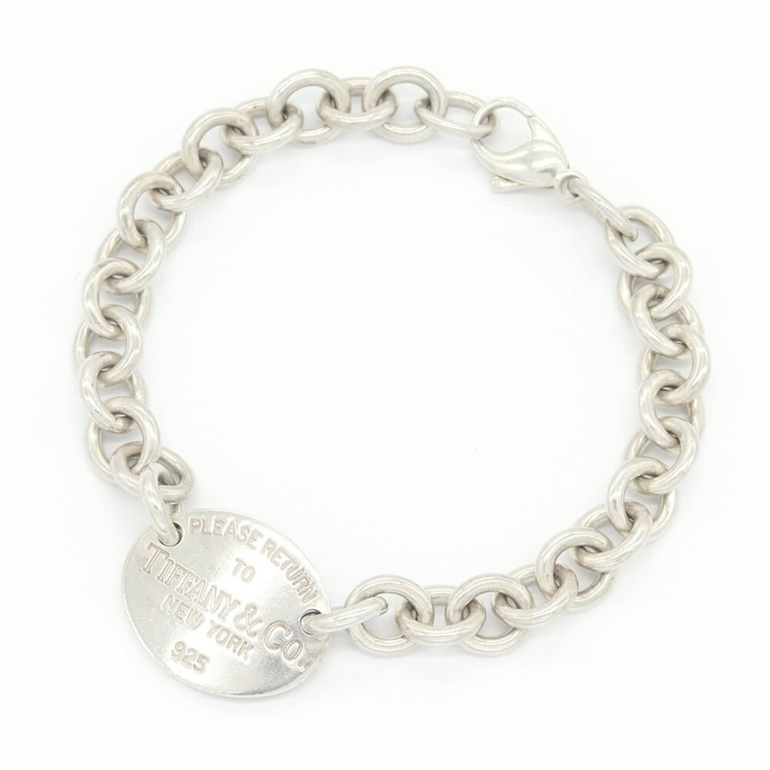 Tiffany & Co. Return to Oval Tag Bracelet, Sterling Silver 925 Bangle Chain Women's.: --- Catalog ---Category: SizeLength: 18.5cm / 7.28''Category: DesignType: Charm braceletColor: SilverGender: WomenMaterial: Sterling silver 925Category: GeneralBrand: Tiffany--- Item List ---Section: 
