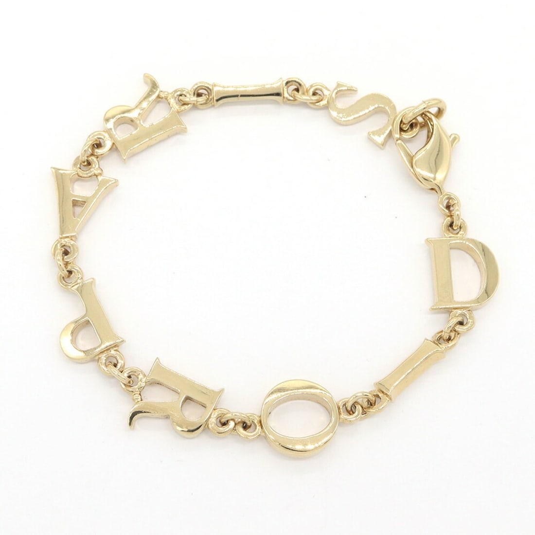 Christian Dior Dior bracelet, gold metal, vintage, women's.: --- Catalog ---Category: SizeLength: 20cm / 7.87''Category: DesignType: Charm braceletColor: GoldGender: WomenMaterial: MetalCategory: GeneralBrand: Christian Dior--- Item List ---Section: ConditionRa
