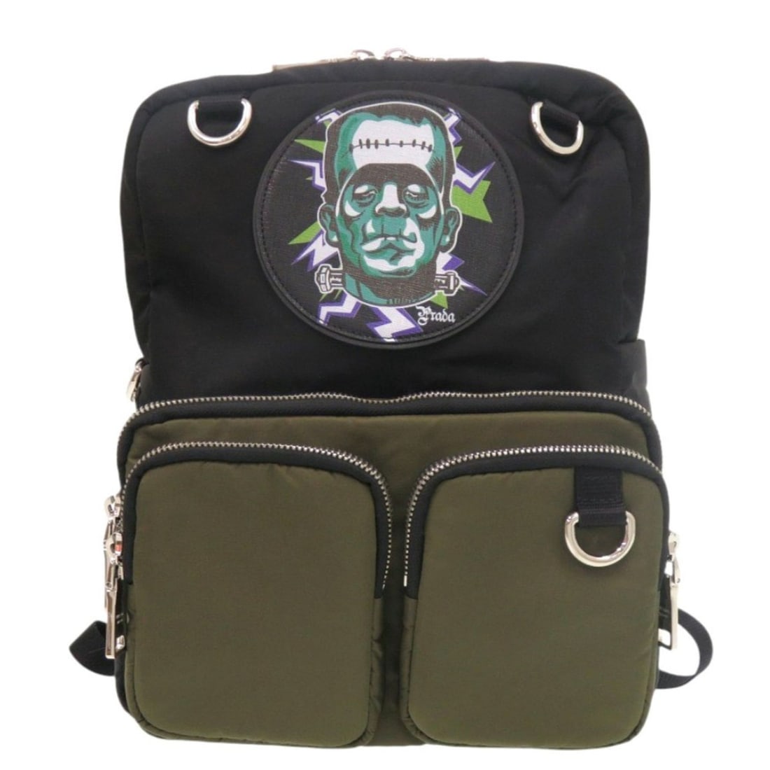 Excellent condition Prada Frankenstein Universal Collaboration 2VZ043 Nylon Black Backpack Daypack: --- Catalog ---Category: SizeSize (HxWxD): 32cm x 25cm x 9cm / 12.59'' x 9.84'' x 3.54''Category: DesignType: BackpackColor: Black, KhakiGender: MenMaterial: Nylon Category: GeneralBrand: Prada--- Ite