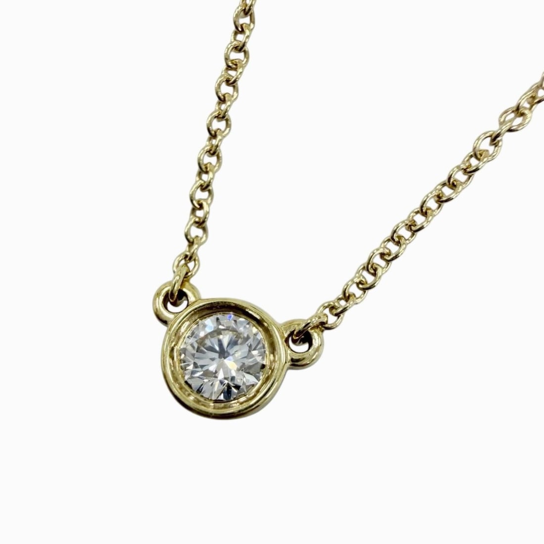 TIFFANY&Co. Tiffany & Co. Elsa Peretti Diamond by the Yard Single Pendant AU750 (YG) 0.17ct Necklace: --- Catalog ---Category: SizePendant Size: 5mm / 0.19''Neck Circumference: 40 cm / 15.74''Category: DesignColor: Yellow goldStone: DiamondGender: WomenMaterial: Yellow gold (18K)Necklace Type: Necklac