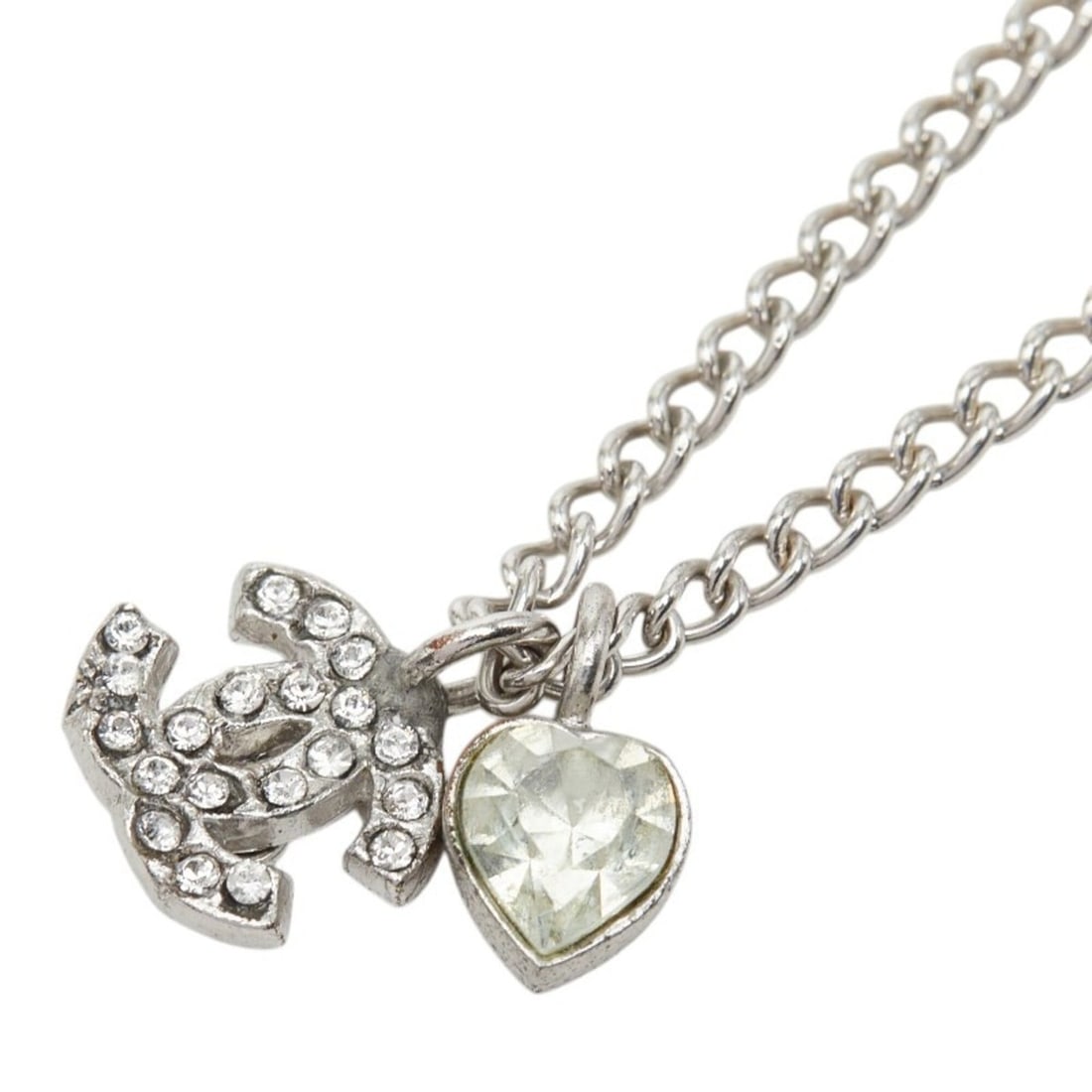 Chanel Coco Mark Heart Pendant Necklace 08C Silver Metal Rhinestone Women's CHANEL: --- Catalog ---Category: SizePendant Size: 11.4mm x 9.5mm / 0.44'' x 0.37''Neck Circumference: 43 cm / 16.92''Category: DesignColor: SilverGender: WomenMaterial: Metal, RhinestoneNecklace Type: Neckla