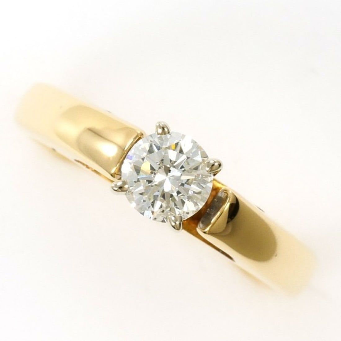 14K Yellow Gold Ring with 0.31 Carat Diamond (SI2 Clarity), Certificate of Authenticity, Total: --- Catalog ---Category: SizeWidth: 4mm / 0.16''Weight: 2.8g / 0.09oz.JP Size: 6US Size: 3.5Category: DesignType: Band ringColor: Yellow goldMetal: GoldStone: DiamondGender: WomenMaterial: Yellow gold