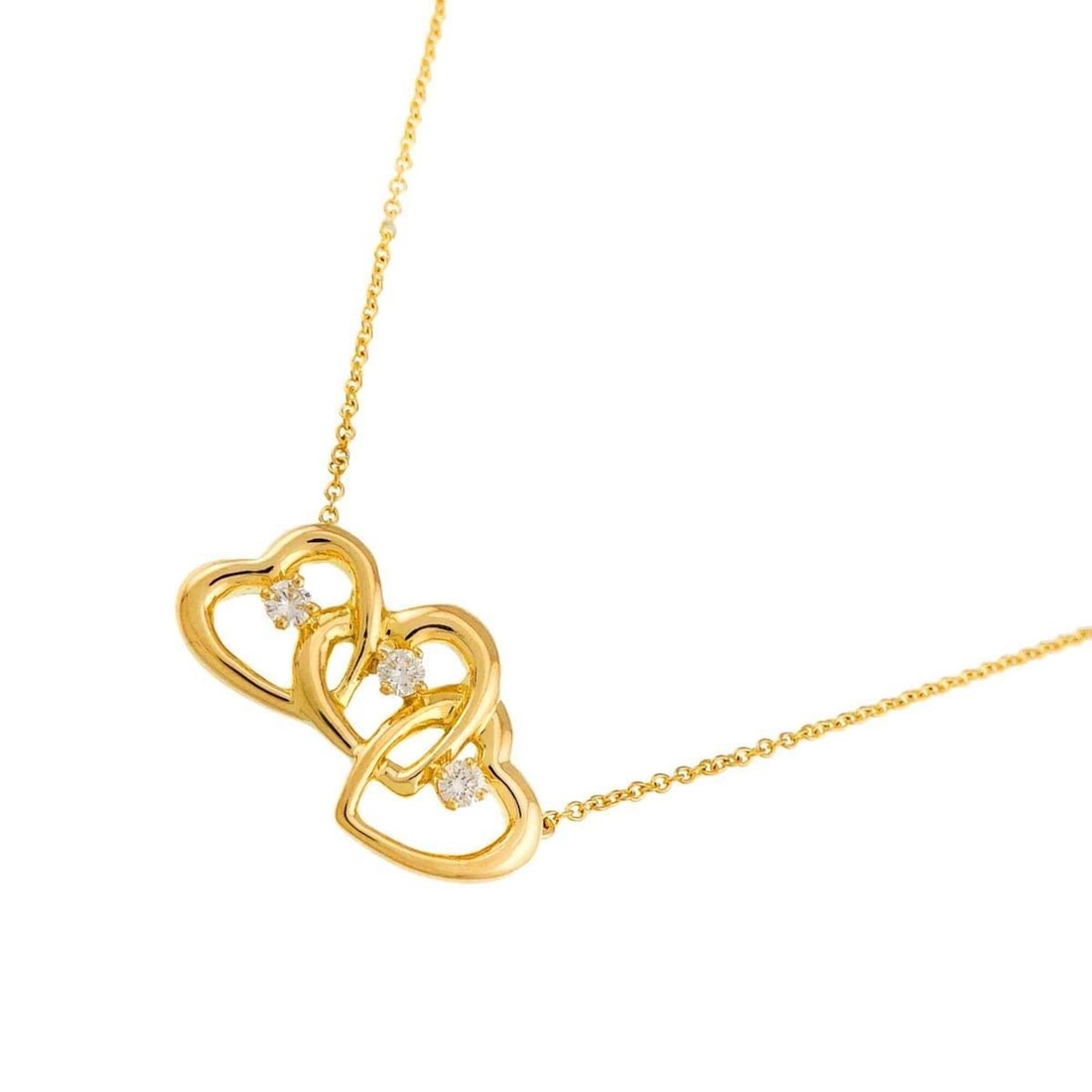 Tiffany & Co. Triple Heart Diamond Necklace, 42cm, 18K Yellow Gold (750): --- Catalog ---Category: SizePendant Size: 12.8mm x 23mm / 0.5'' x 0.9''Neck Circumference: 42 cm / 16.53''Category: DesignColor: Yellow goldGender: WomenMaterial: Yellow gold (18K)Necklace Type: Neck