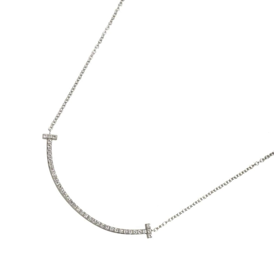 Tiffany & Co. T Smile Diamond Necklace, Small, 40cm, 18K WG White Gold 750: --- Catalog ---Category: SizePendant Size: 3.6mm x 36mm / 0.14'' x 1.41''Neck Circumference: 40 cm / 15.74''Category: DesignGender: WomenMaterial: White gold (18K)Necklace Type: NecklaceCategory: Gene