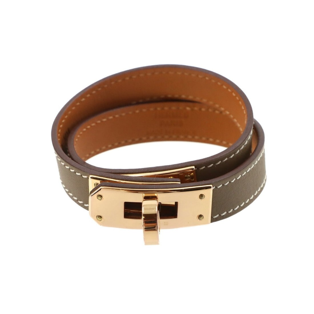 Hermes Kelly Double Tour Bracelet, Swift Leather, Etoupe, K Stamp, T2, Rose Gold Hardware: --- Catalog ---Category: SizeLength: 14.3cm / 5.62''Category: DesignType: Charm braceletColor: Etoupe grayGender: WomenMaterial: Swift leatherCategory: GeneralBrand: HermesCountry of Origin: