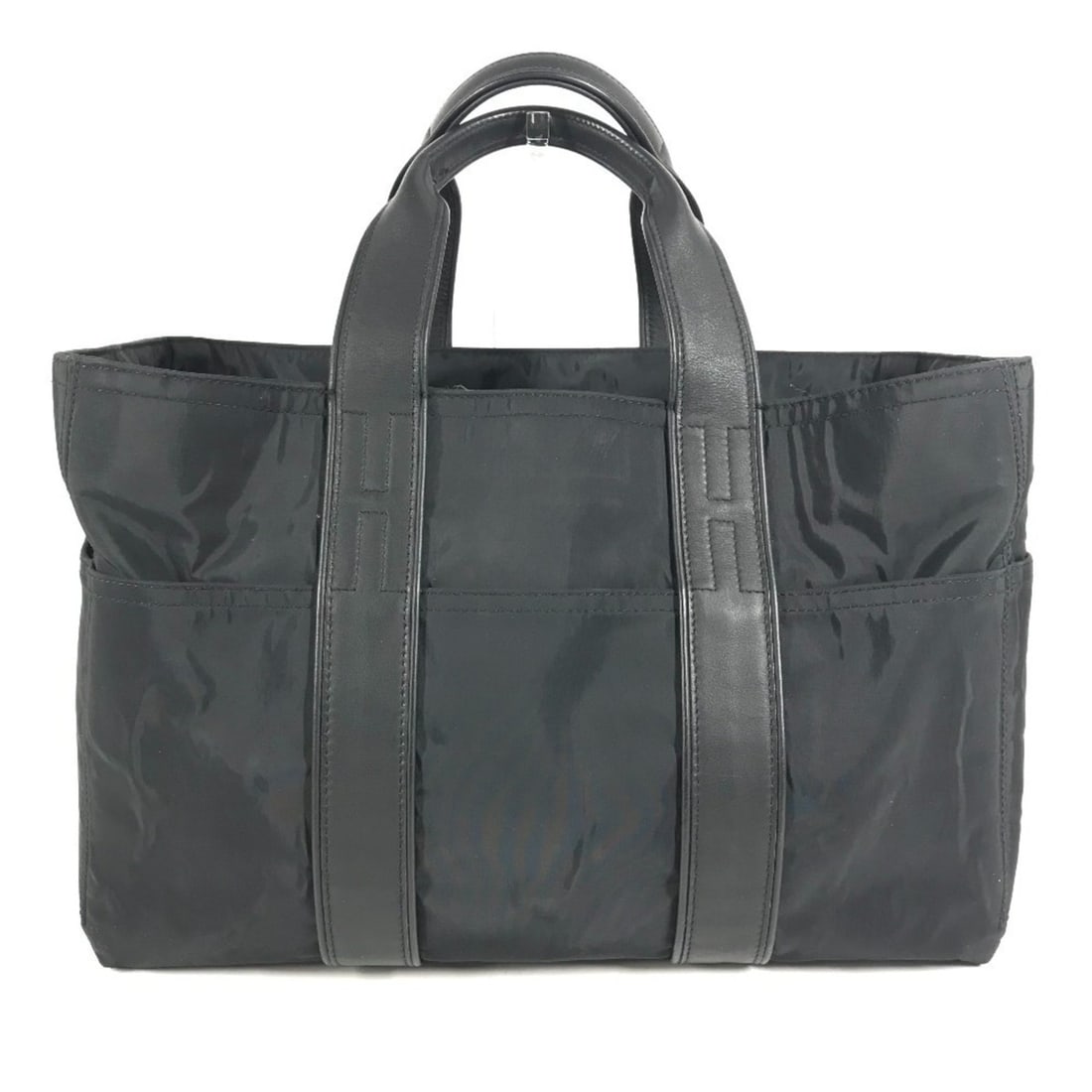 HERMES Acapulco MM bag, mini Boston tote handbag, leather, nylon, men's, women's, black.: --- Catalog ---Category: DesignType: Boston bag, Handbag, Tote bagColor: BlackGender: Men,WomenMaterial: Leather , Nylon Category: GeneralBrand: HermesCountry of Origin: France--- Item List ---Section