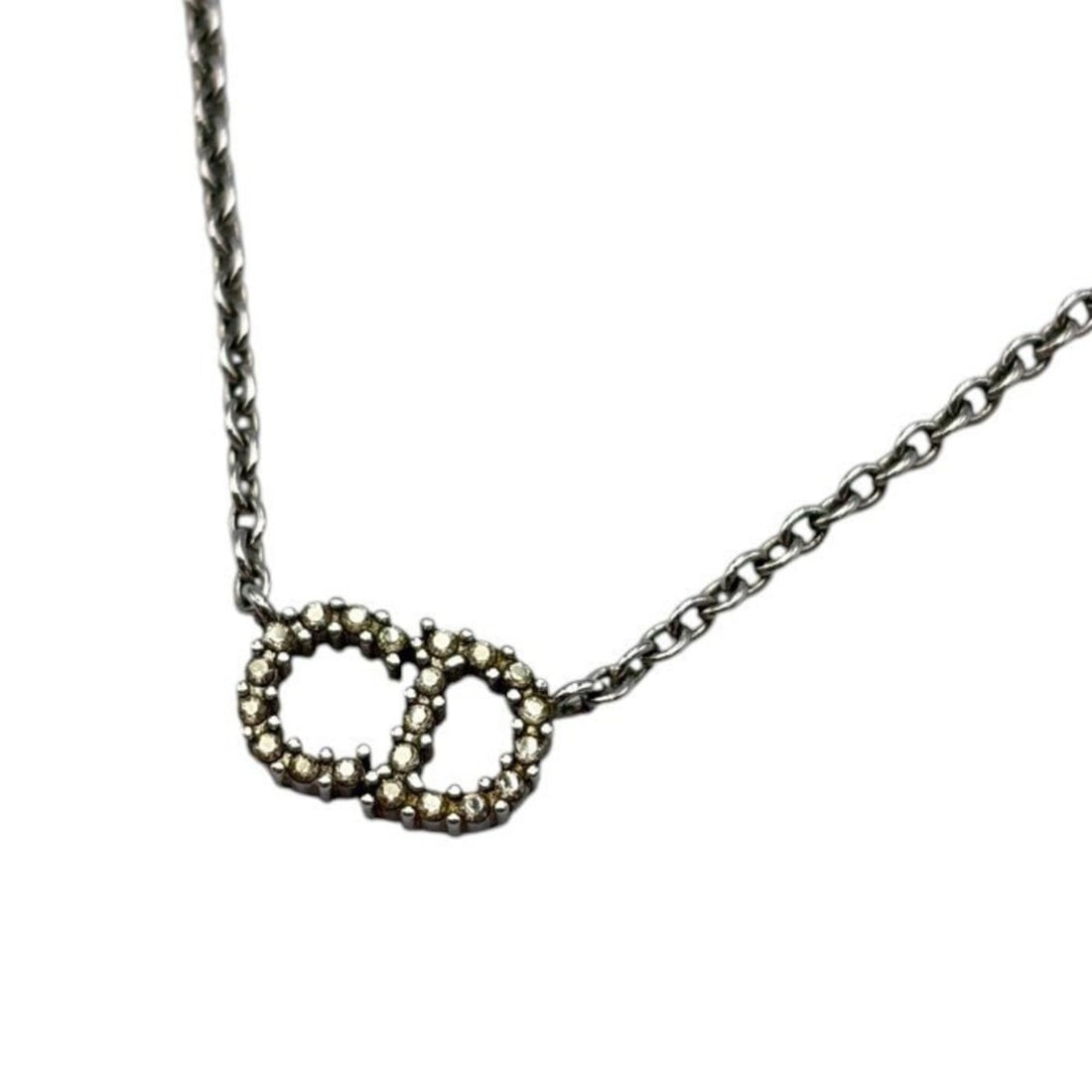 Christian Dior Dior Clair D Lune Rhinestone Necklace: --- Catalog ---Category: SizePendant Size: 1.7mm x 1mm / 0.06'' x 0.03''Neck Circumference: 49 cm / 19.29''Category: DesignColor: SilverGender: WomenNecklace Type: NecklaceCategory: GeneralBrand: Chri