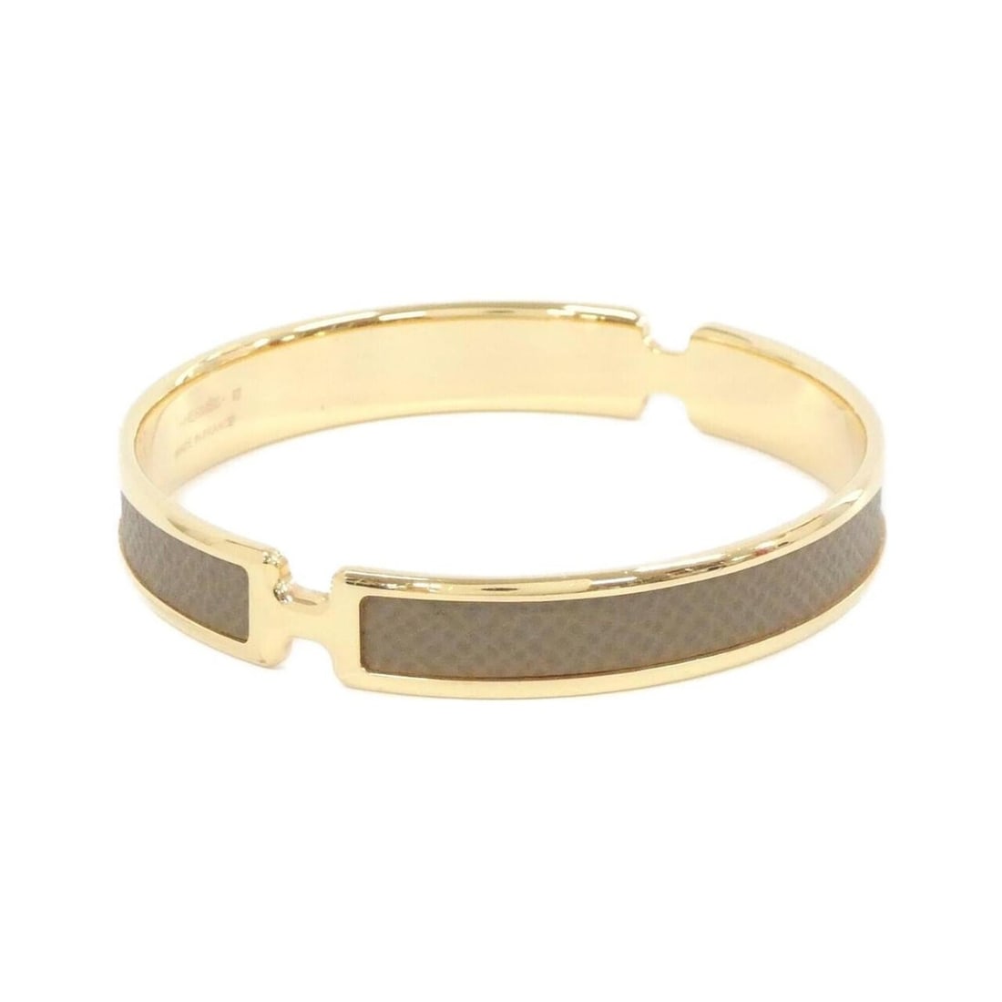 Hermes Olympe 010736CC Bangle: --- Catalog ---Category: SizeLength: 20cm / 7.87''Category: DesignType: BangleColor: Etoupe gray, GoldGender: Men,WomenMaterial: Epsom leatherCategory: GeneralMPN: 010736CCBrand: Hermes--- Item List