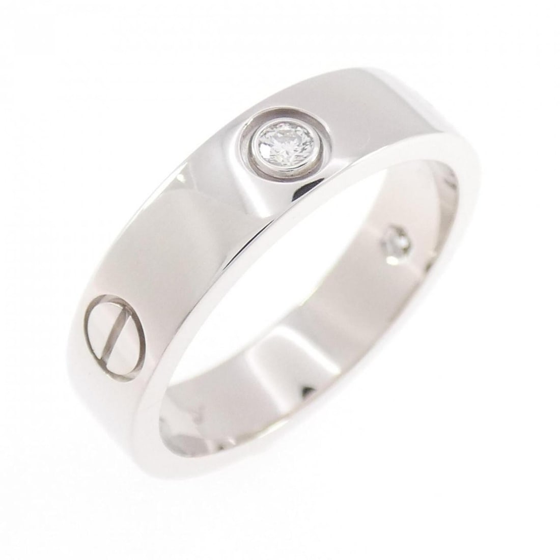 Cartier Love Half-Diamond Ring: --- Catalog ---Category: SizeUS Size: 11Brand Size: 63Category: DesignType: Band ringStone: DiamondGender: Men,WomenMaterial: White gold (18K)Category: GeneralMPN: B4032500Brand: Cartier--- Item List 