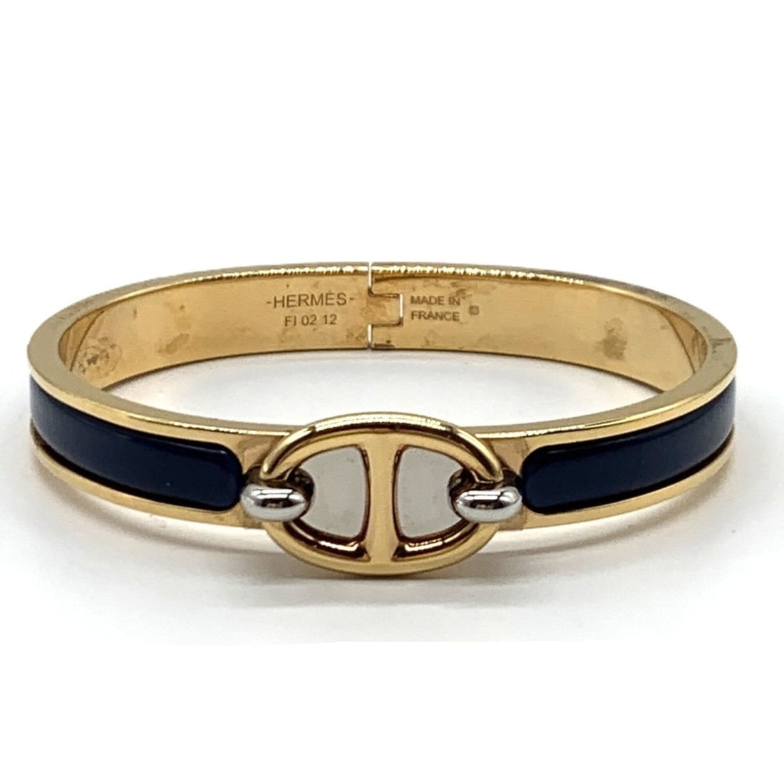 Hermes Mini Click Chaine d'Ancre Yellow Gold Plated Bracelet H209000F HERMES: --- Catalog ---Category: SizeWidth: 8mm / 0.31''Length: 16cm / 6.29''Category: DesignType: Charm braceletColor: Yellow goldGender: WomenMaterial: EnamelCategory: GeneralLine: ClicBrand: Hermes--- Item
