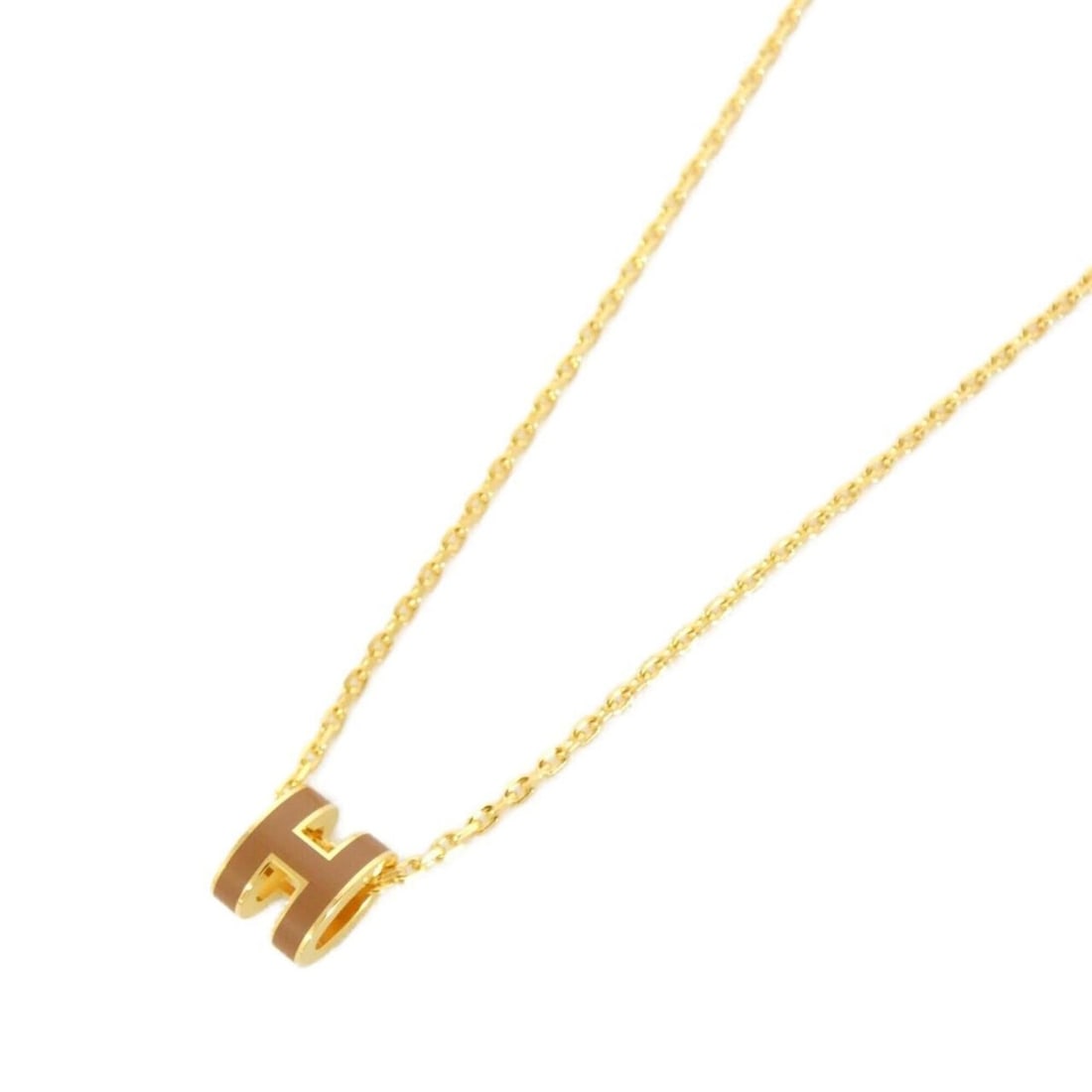 Hermes Pop H MINI 147992F Necklace: --- Catalog ---Category: SizePendant Size: 9mm x 7mm / 0.35'' x 0.27''Neck Circumference: 40 cm / 15.74''Category: DesignColor: BrownGender: WomenMaterial: PalladiumNecklace Type: NecklaceCategory:
