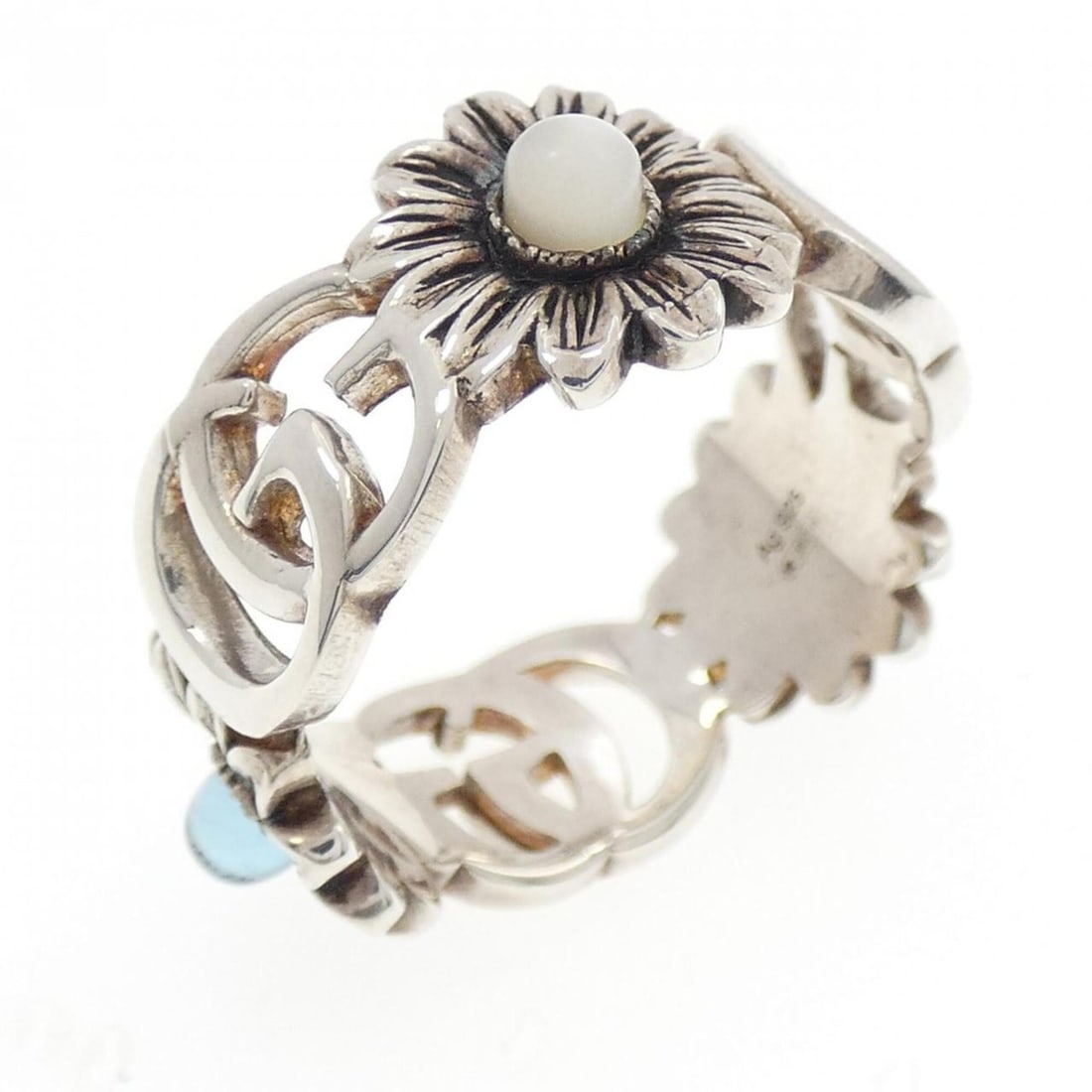 Gucci Double G Flower Ring: --- Catalog ---Category: SizeJP Size: 12.0US Size: 6.5Category: DesignType: Band ringStone: Mother of pearl, TopazGender: WomenMaterial: Silver 925Category: GeneralMPN: 527394 J8474 8517Brand: Gucci--