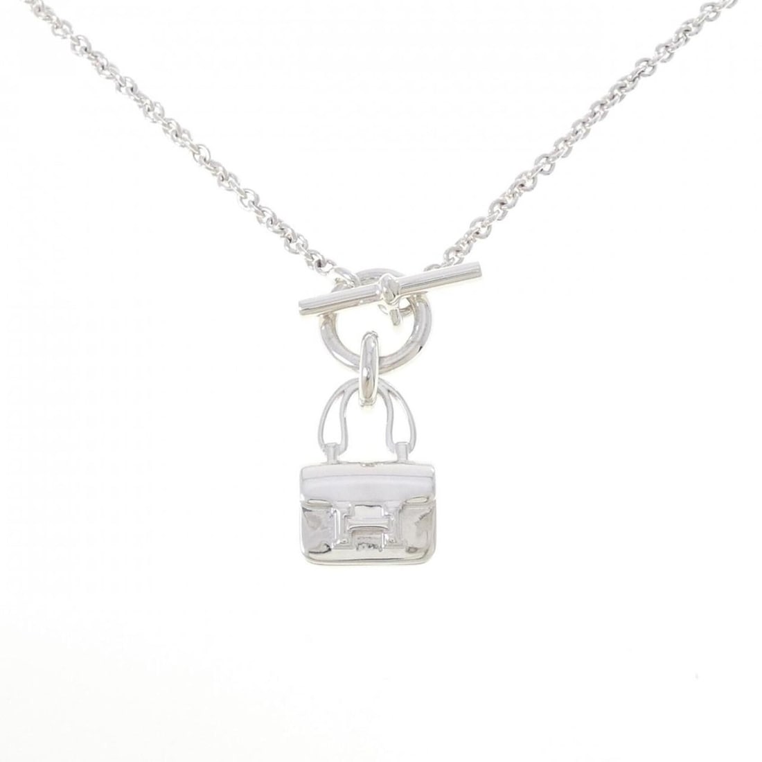 Hermes Amulette Constance Necklace: --- Catalog ---Category: SizePendant Size: 30.7mm x 12.8mm / 1.2'' x 0.5''Neck Circumference: 40 cm / 15.74''Category: DesignGender: WomenMaterial: Silver 925Necklace Type: NecklaceCategory: