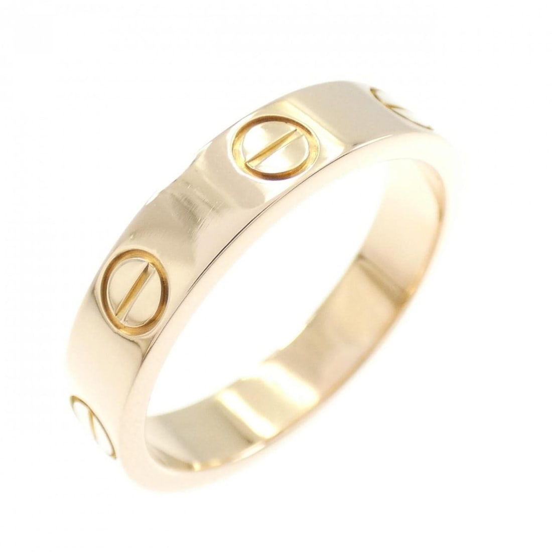 Cartier Mini Love Ring: --- Catalog ---Category: SizeUS Size: 4.5Brand Size: 48Category: DesignType: Band ringColor: Pink goldGender: WomenMaterial: Pink gold (18K)Category: GeneralMPN: B4085000Brand: Cartier--- Item List