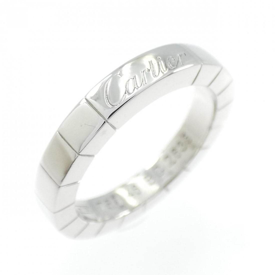 Cartier Lanieres Ring: --- Catalog ---Category: SizeUS Size: 3.5Brand Size: 46Category: DesignType: Band ringColor: White goldGender: WomenMaterial: White gold (18K)Category: GeneralMPN: B4045000Brand: Cartier--- Item List 