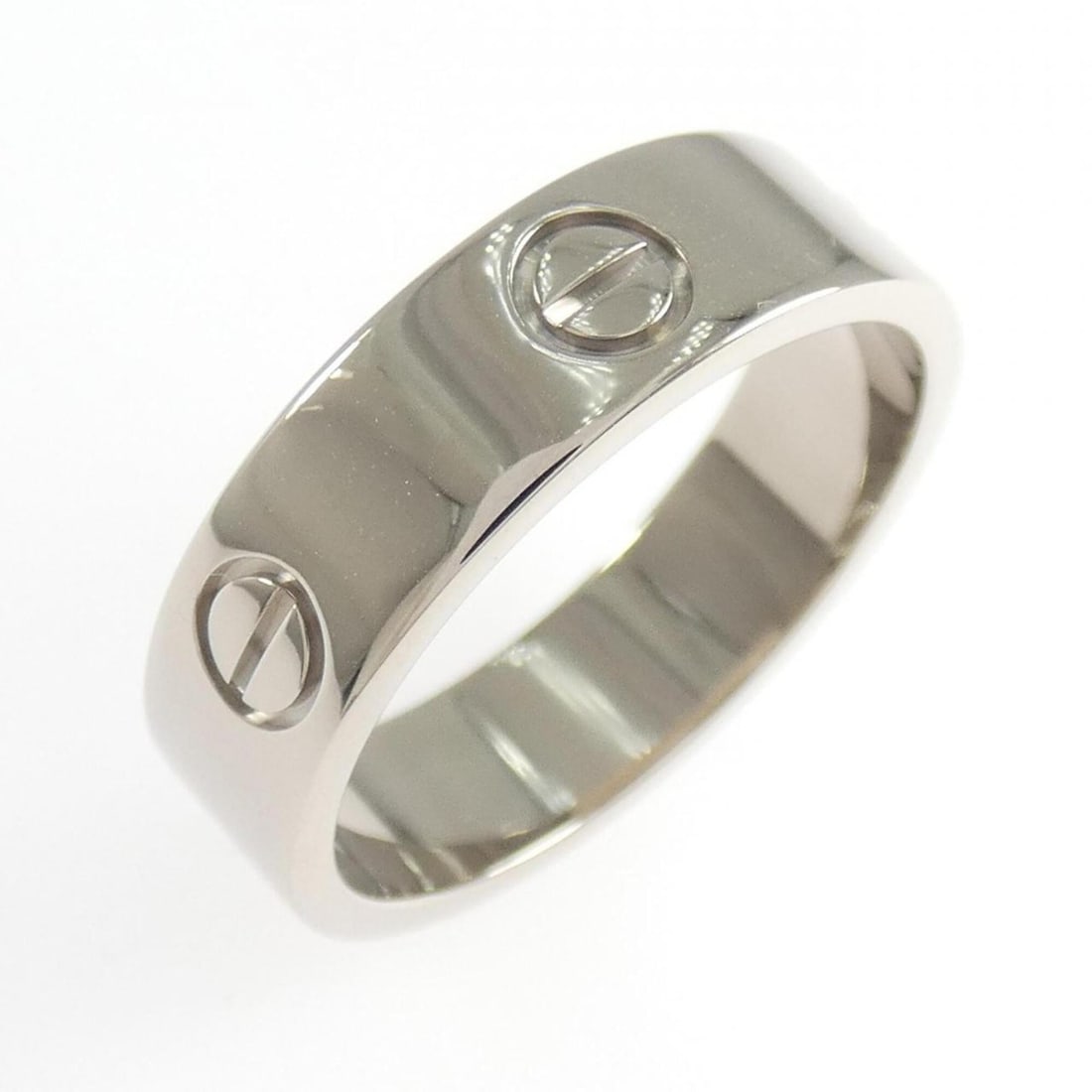 Cartier Love Ring: --- Catalog ---Category: SizeUS Size: 10Brand Size: 61Category: DesignType: Band ringColor: White goldGender: Women,MenMaterial: White gold (18K)Category: GeneralMPN: B4084700Brand: Cartier--- Item
