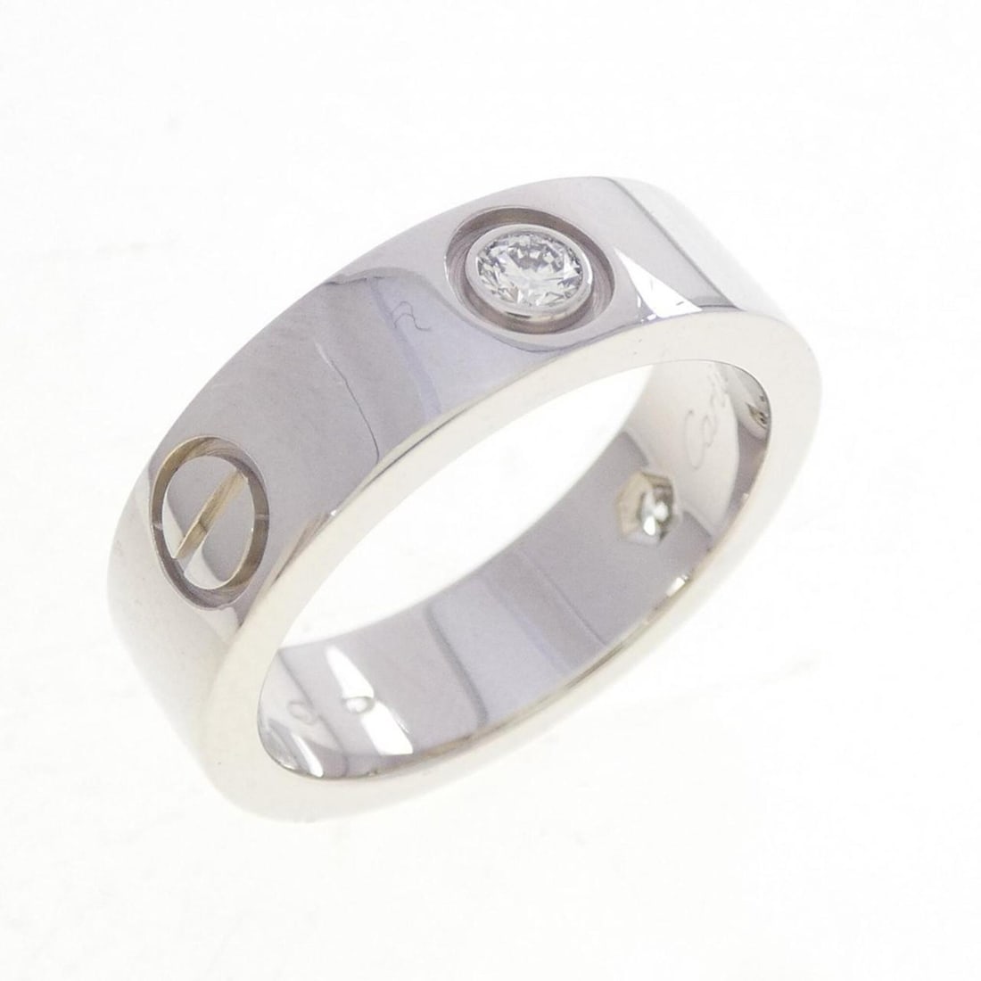 Cartier Love Half-Diamond Ring: --- Catalog ---Category: SizeUS Size: 6Brand Size: 51Category: DesignType: Band ringColor: White goldStone: DiamondGender: WomenMaterial: White gold (18K)Category: GeneralBrand: Cartier--- Item List -