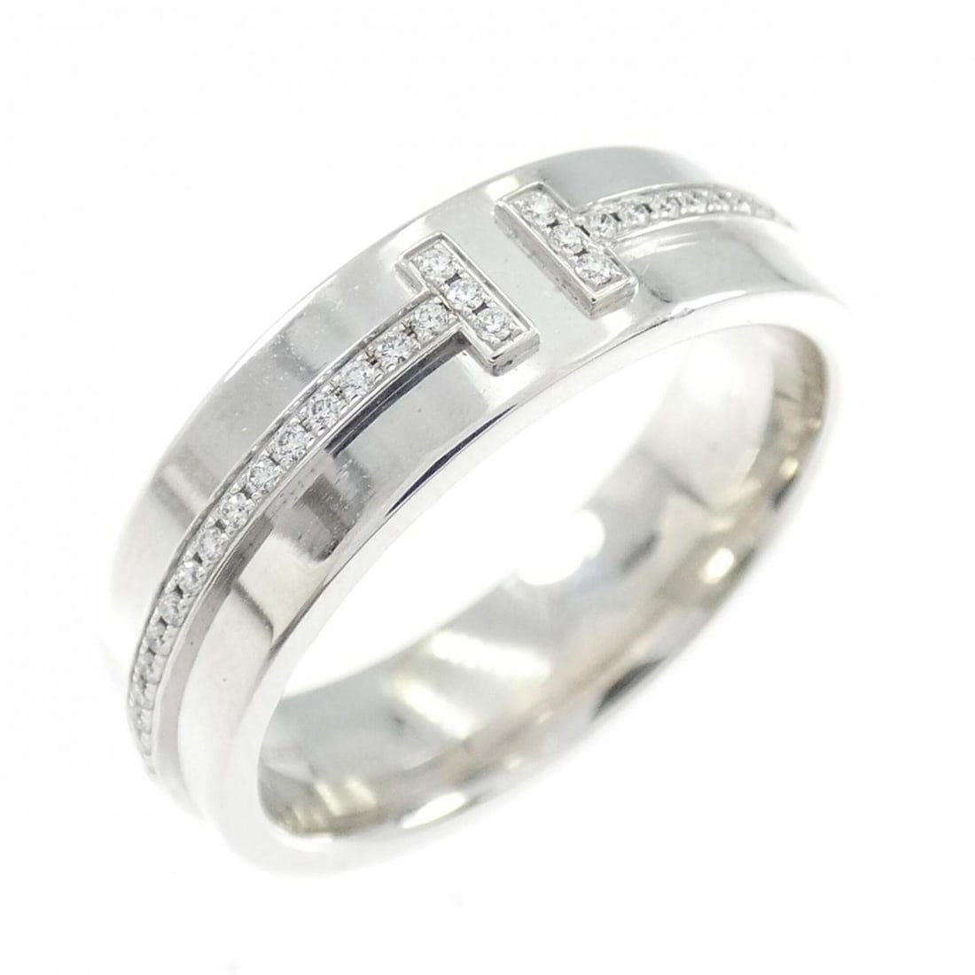 Tiffany T Toe Ring: --- Catalog ---Category: SizeJP Size: 14.0US Size: 7Category: DesignType: Band ringStone: DiamondGender: WomenMaterial: White gold (18K)Category: GeneralBrand: Tiffany--- Item List ---Section: Conditi